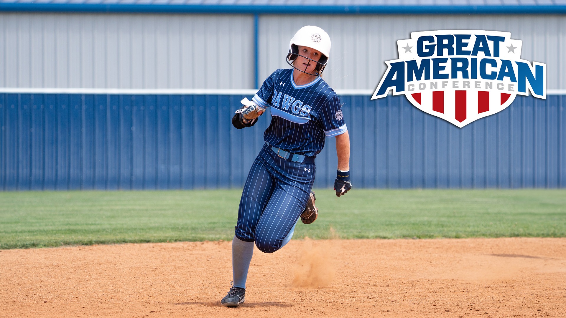taylor mcmahon running the bases with a GAC logo on the picture
