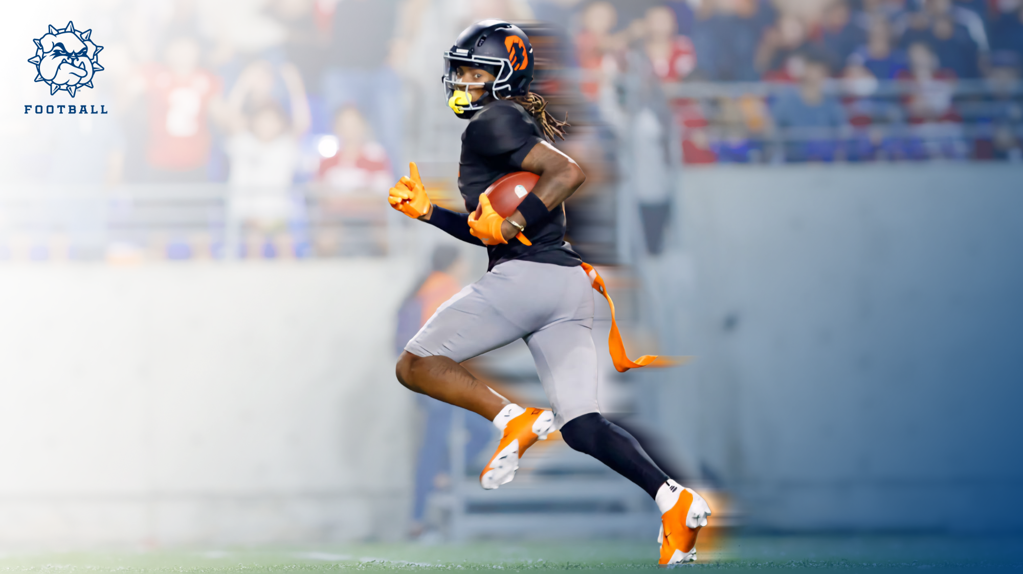 Torin Justice runs with a ball after a catch in the LFA