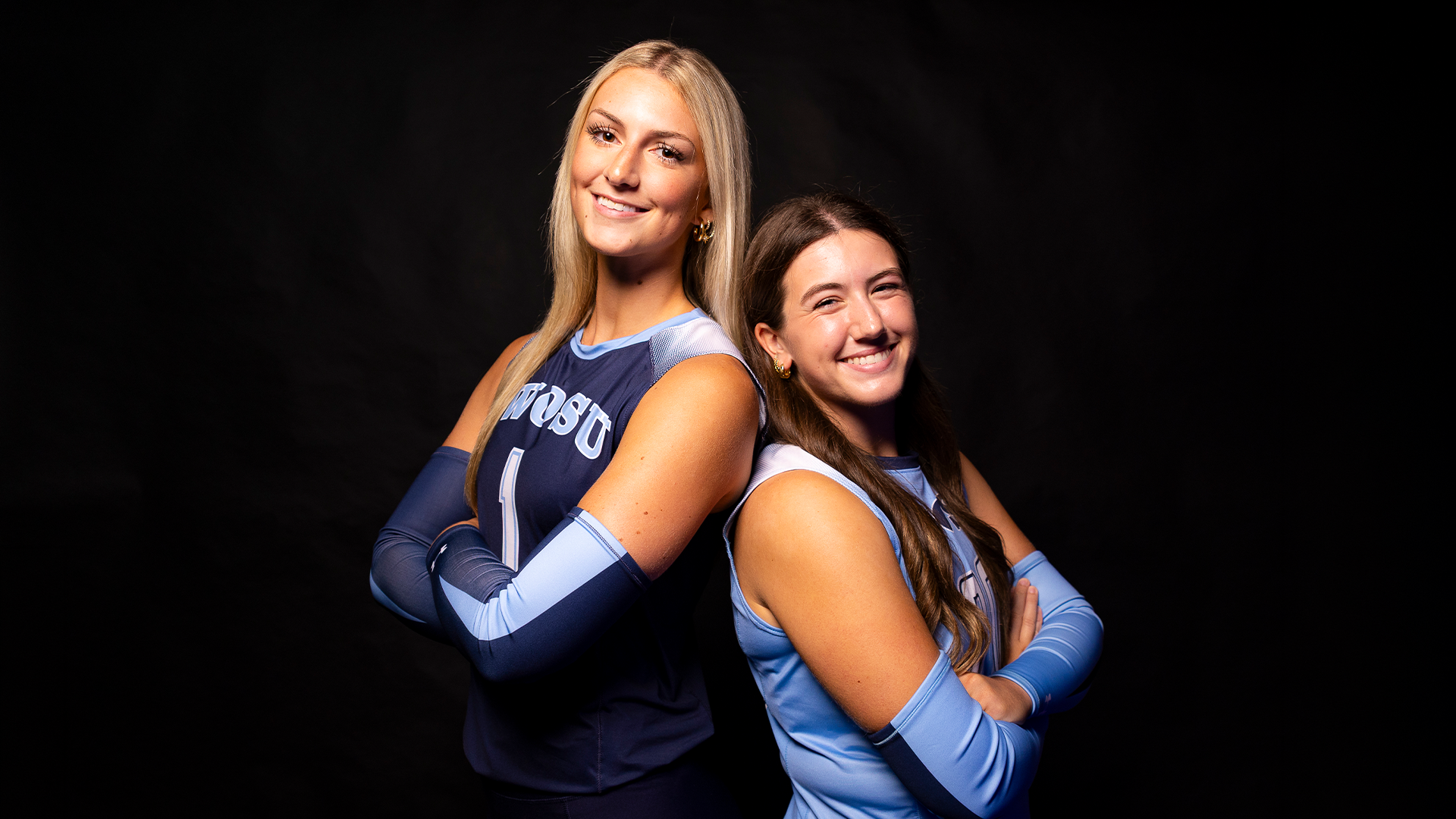 Madeline Harris and Hailey Thomas back to back during Media Day pictures