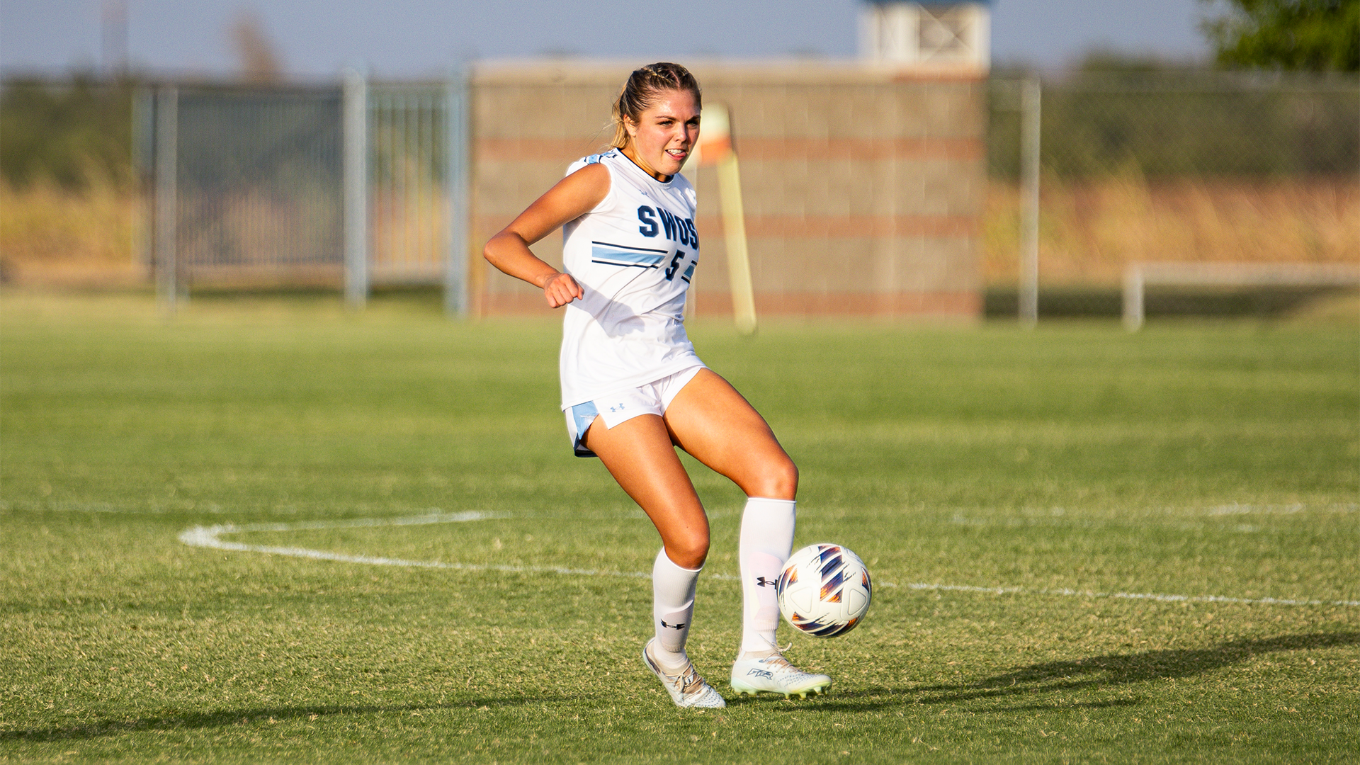 Maya Thornburg dribbles soccer ball