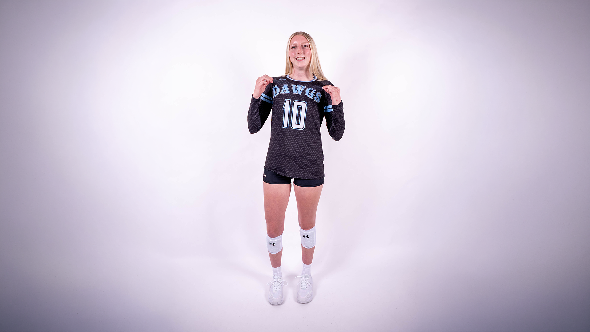 Layla Collins poses during media day pictures