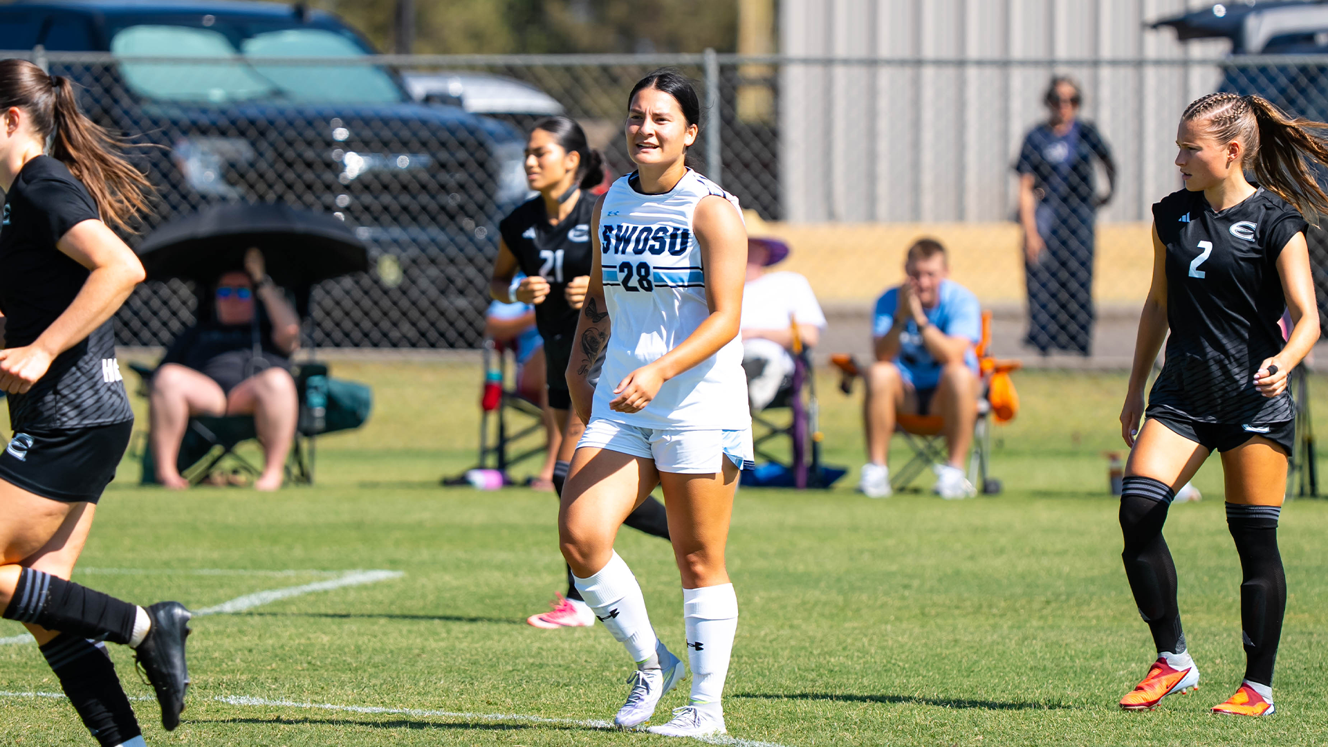 Madelyn Kitchen catches her breath mid match