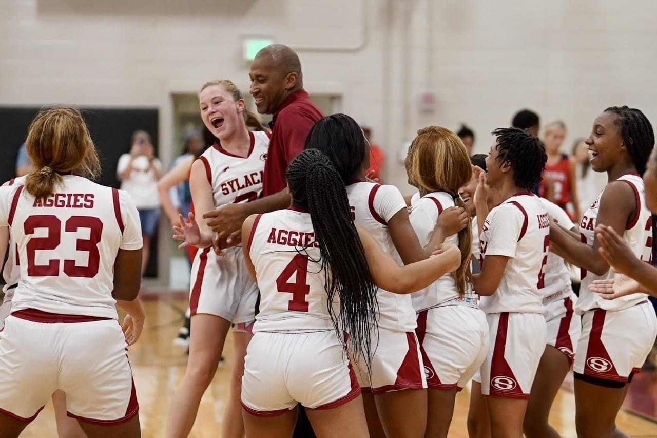Sylacauga Lady Aggies celebrate a win over Clay Central