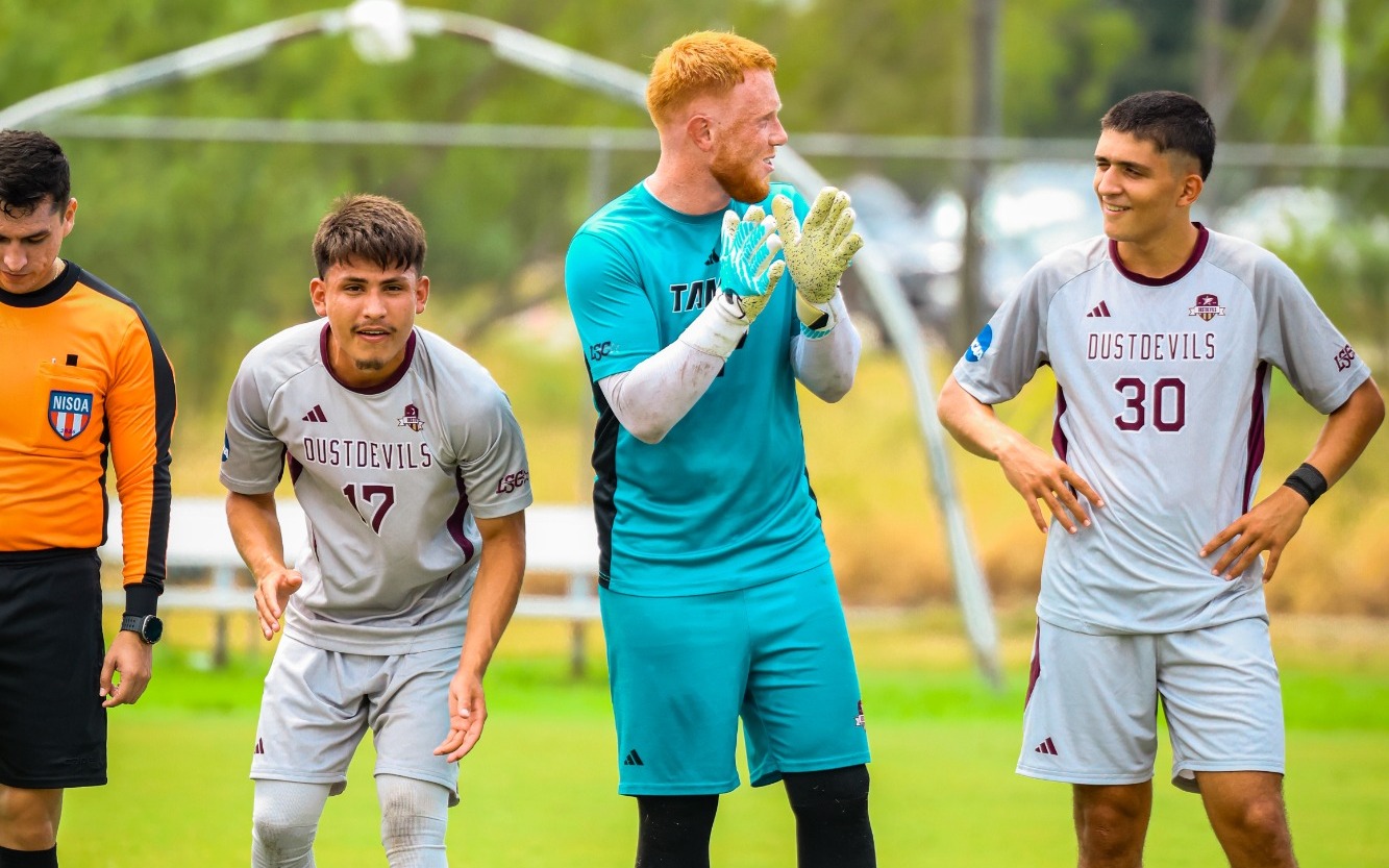 Nicklas Berg-Eriksen clapping, along with Kamal Zulfiyev and Jorge Delgado lined up before the match.