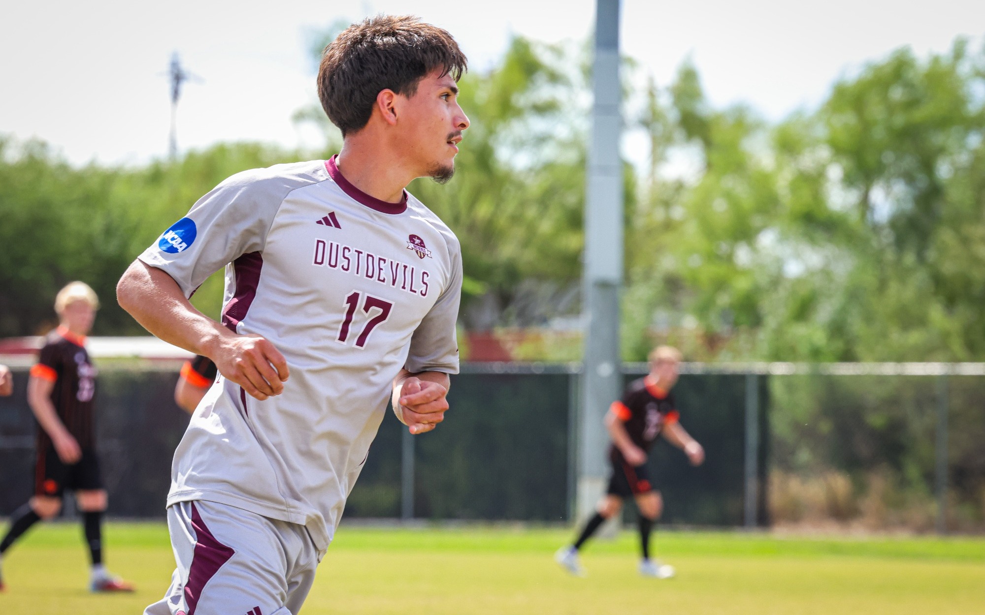Jorge Delgado jogging on the field.