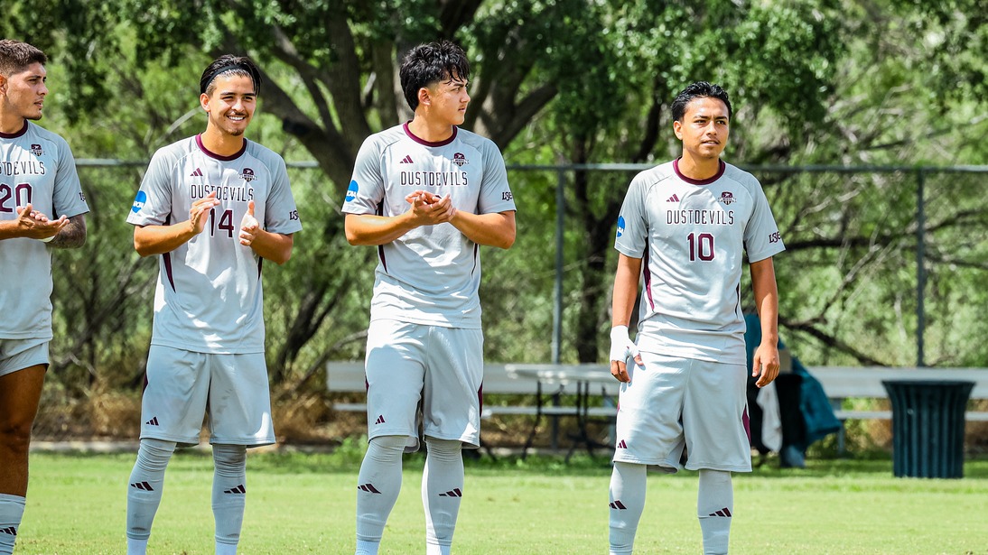 Abner Zuniga stands with his teammates
