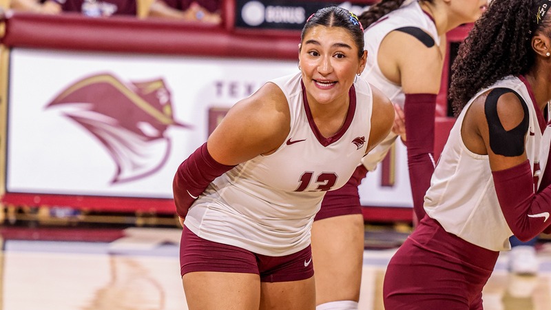 Andrea Nunez communicates with her team