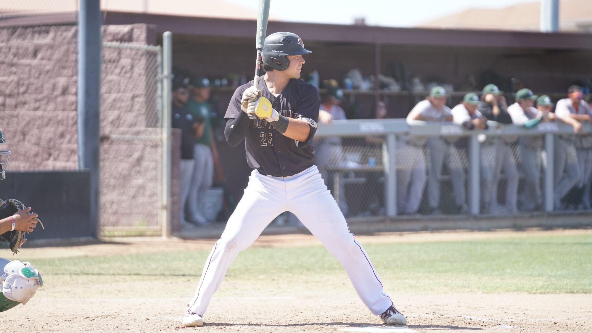 Eddie Saenz stands in the batter's box