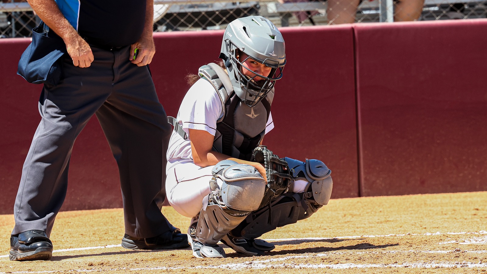 Bella Perez sets behind the plate