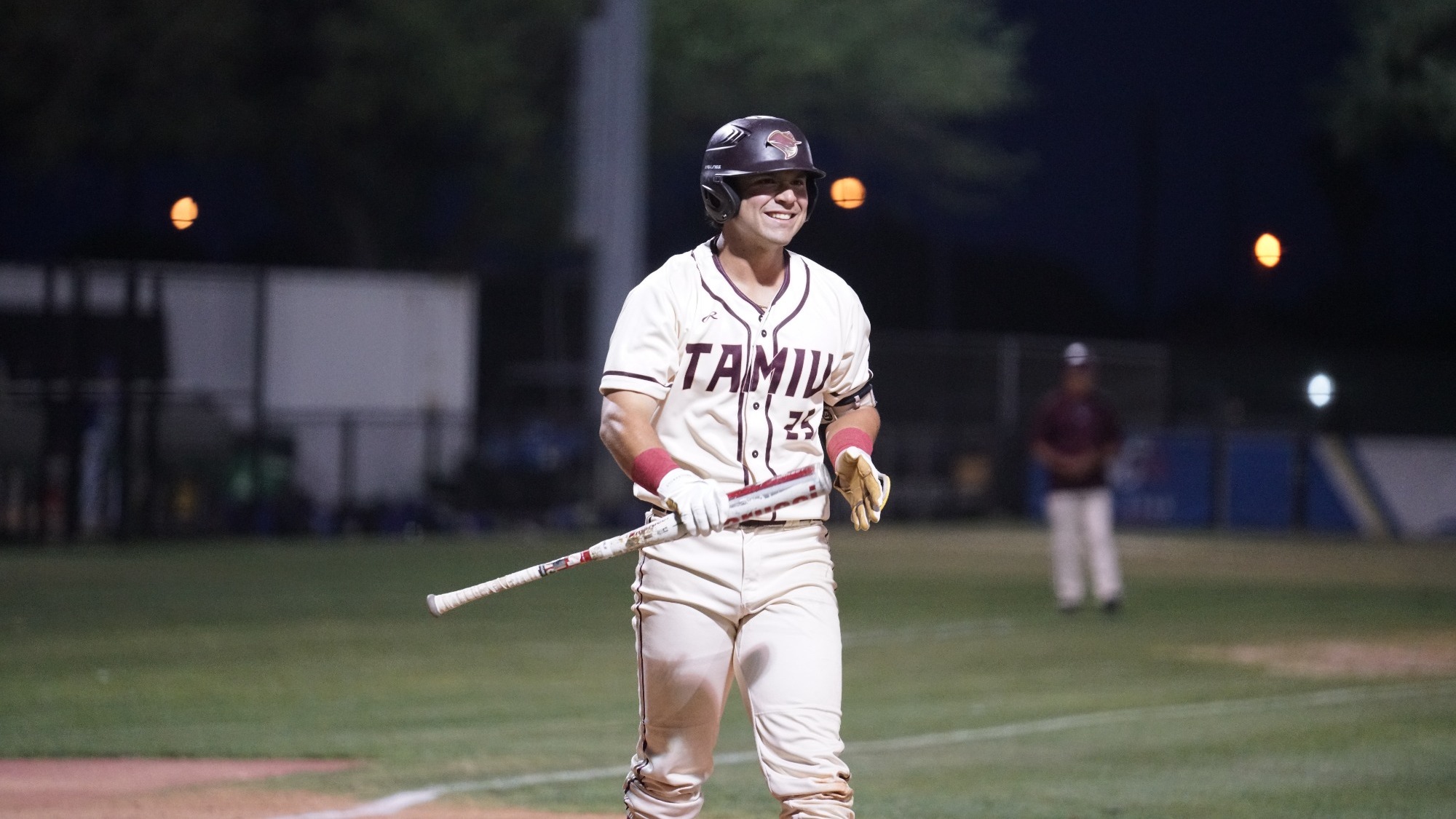 Eddie Saenz Shares a Smile at Home Plate