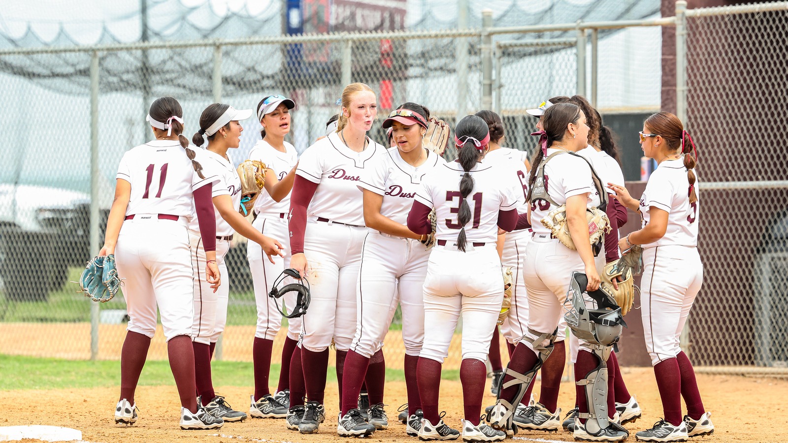 Dustdevils Softball Has a Team Huddle