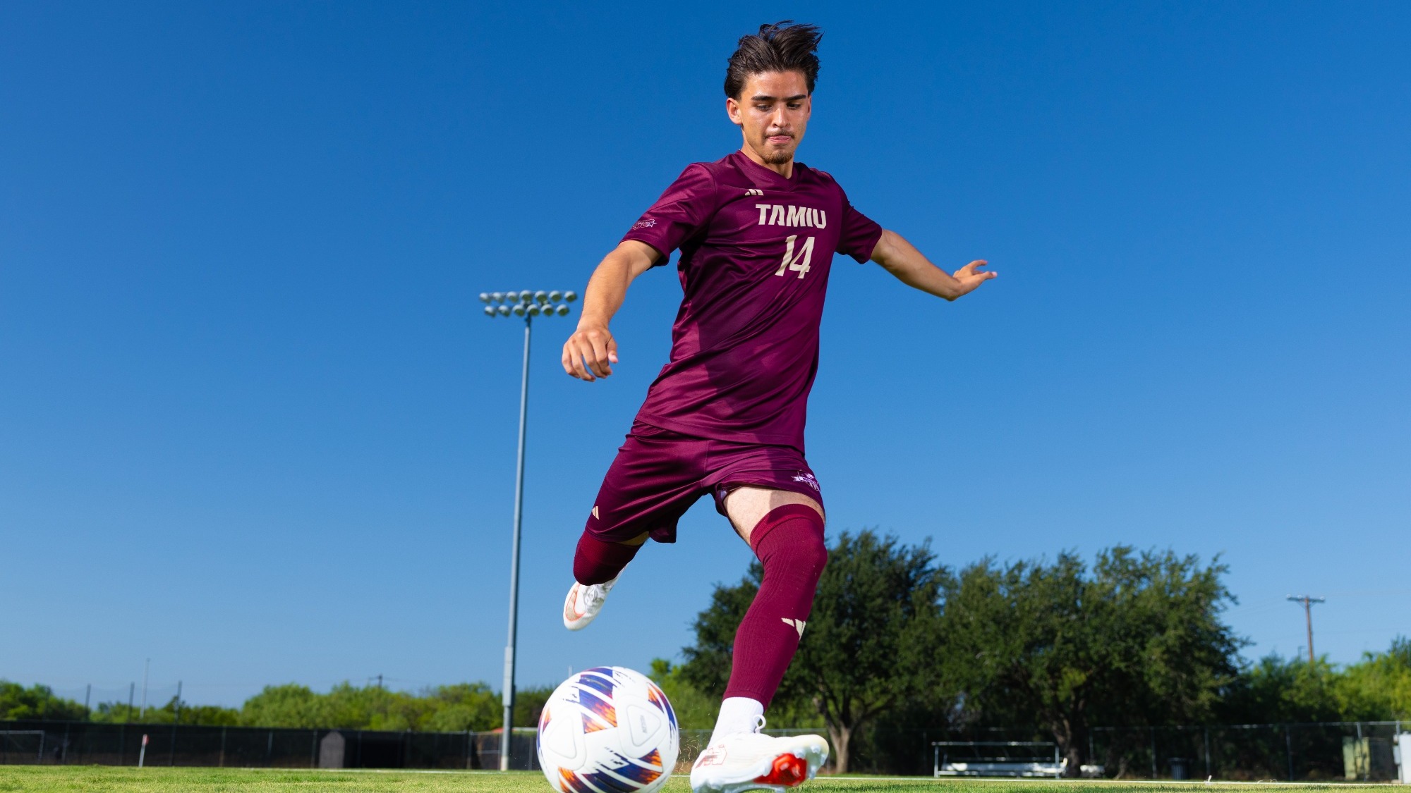 Jaime Martinez Kicks a Soccer Ball