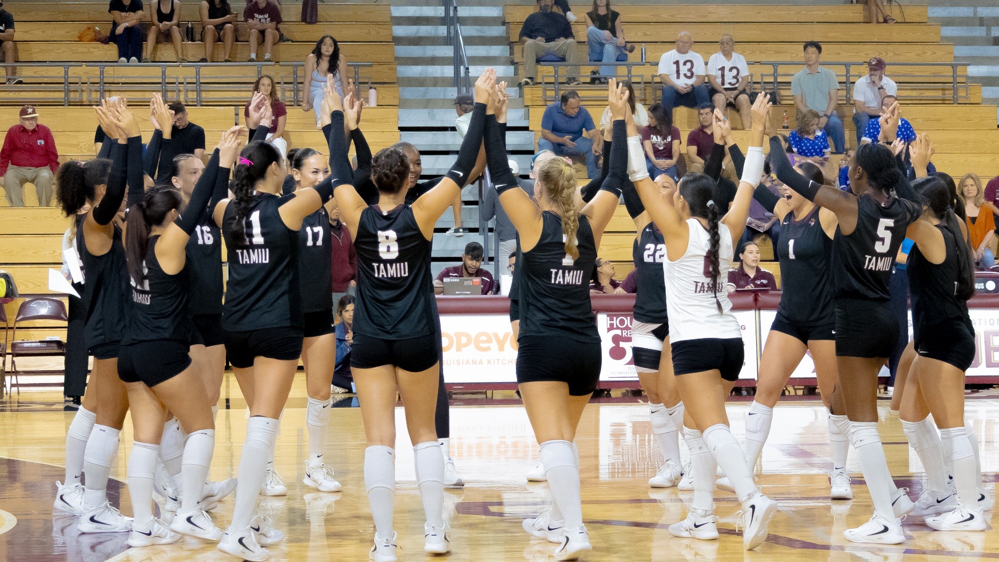 Dustdevil Volleyball huddles pregame