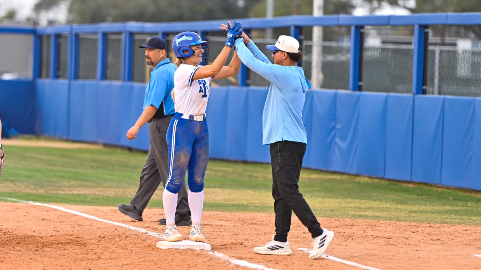 Ella high fiving Little O