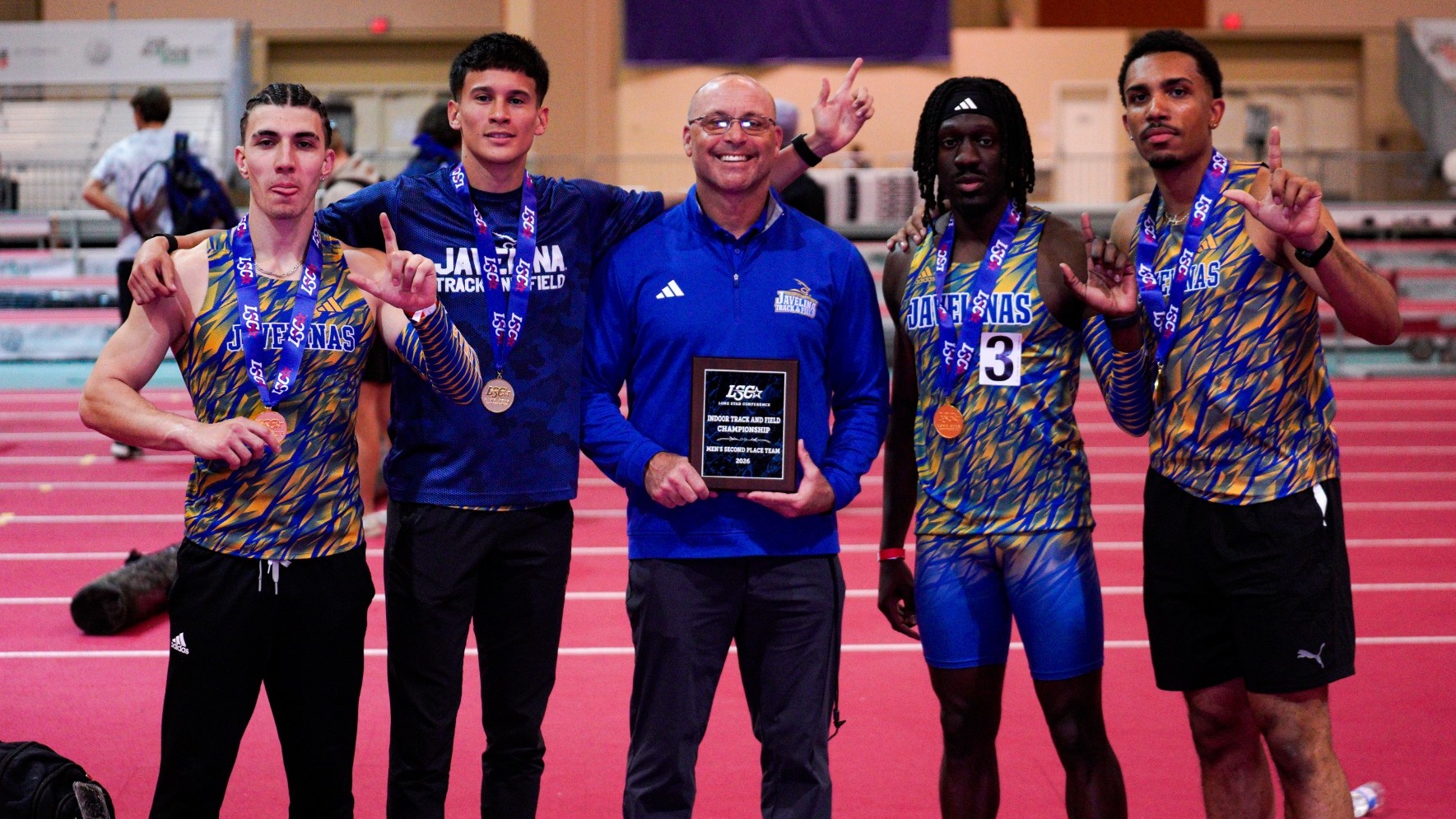 Men's 4x400m relay with Coach Dall