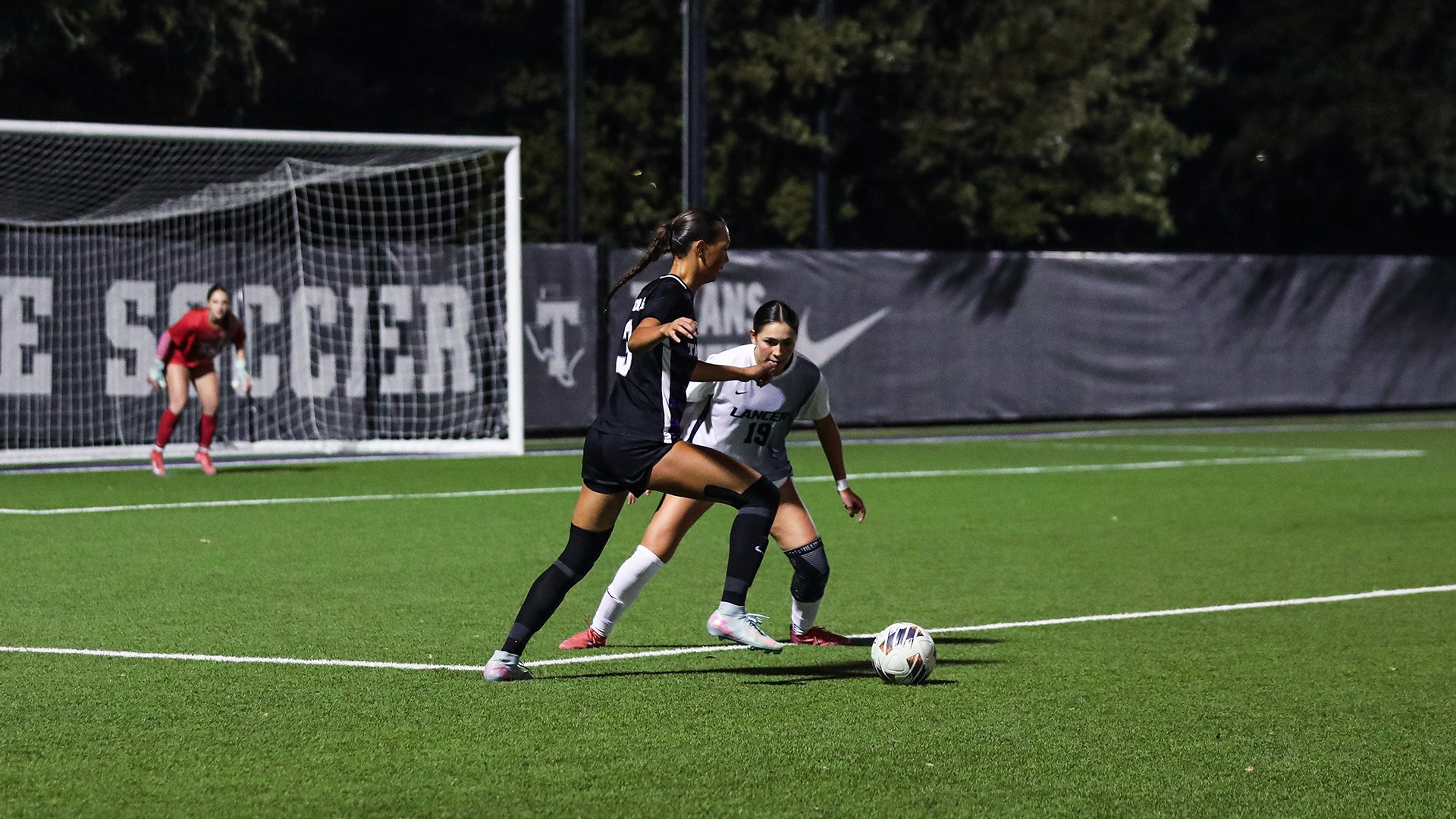 Avery Harr on ball against California Baptist