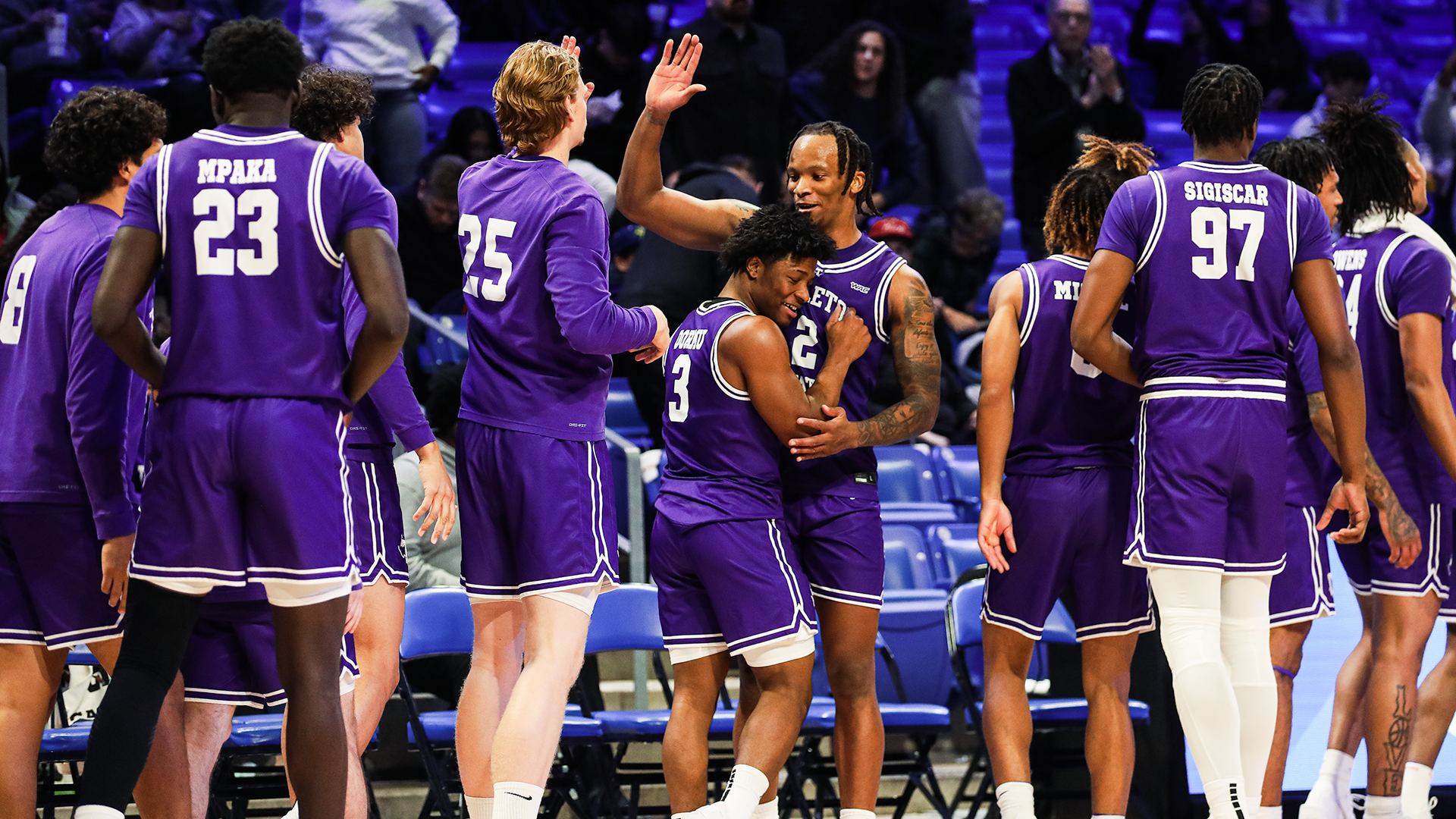 DJ Dormu and Freddy Hicks celebrating at UT Arlington