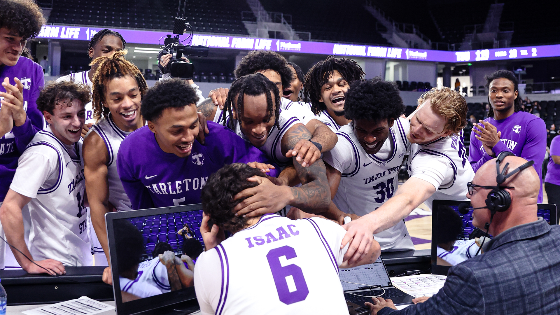 Kaia Isaac mobbed by his teammates during ESPN+ interview postgame