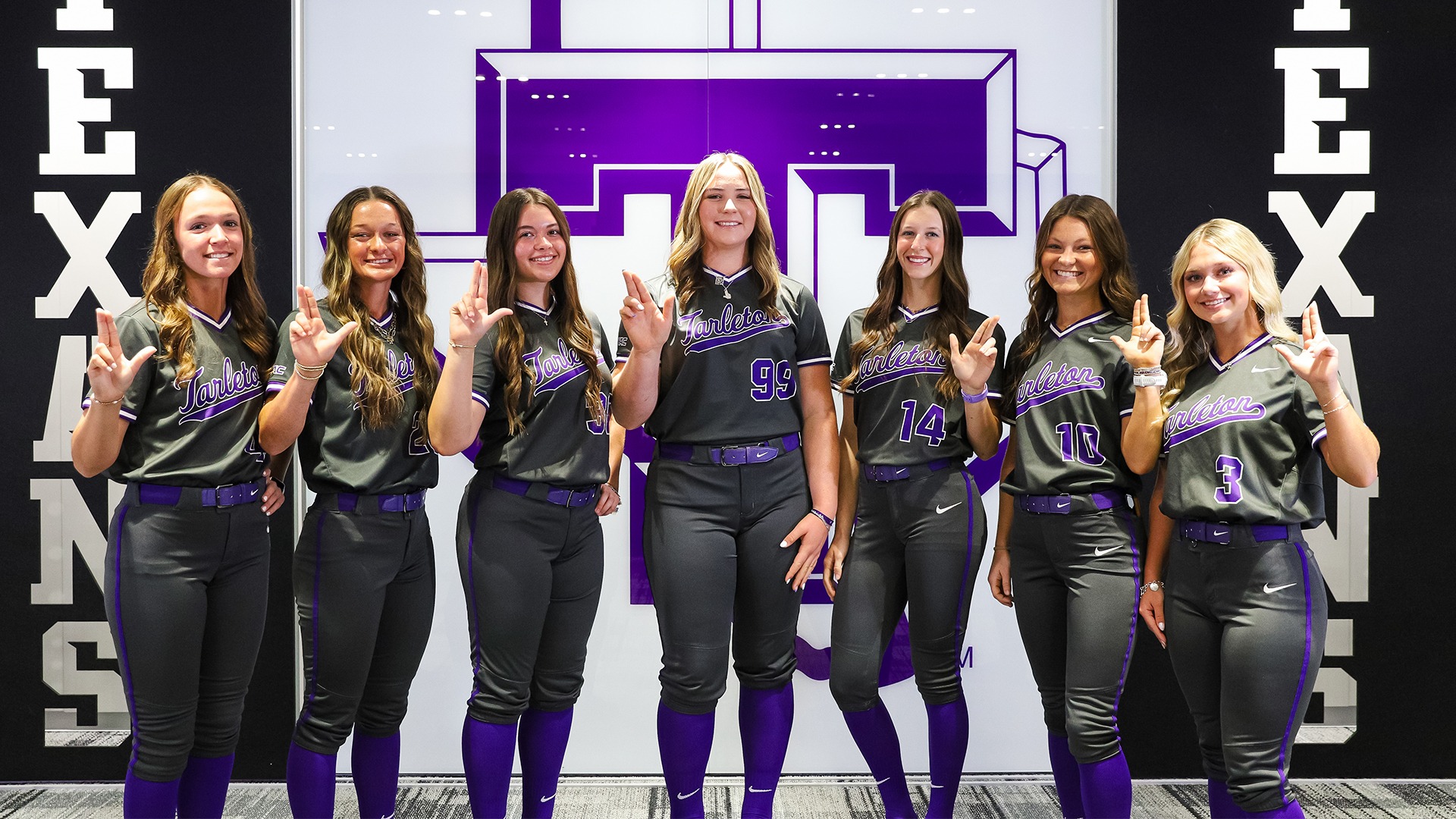 A group photo of the seven members of the 2026 signing class for softball.