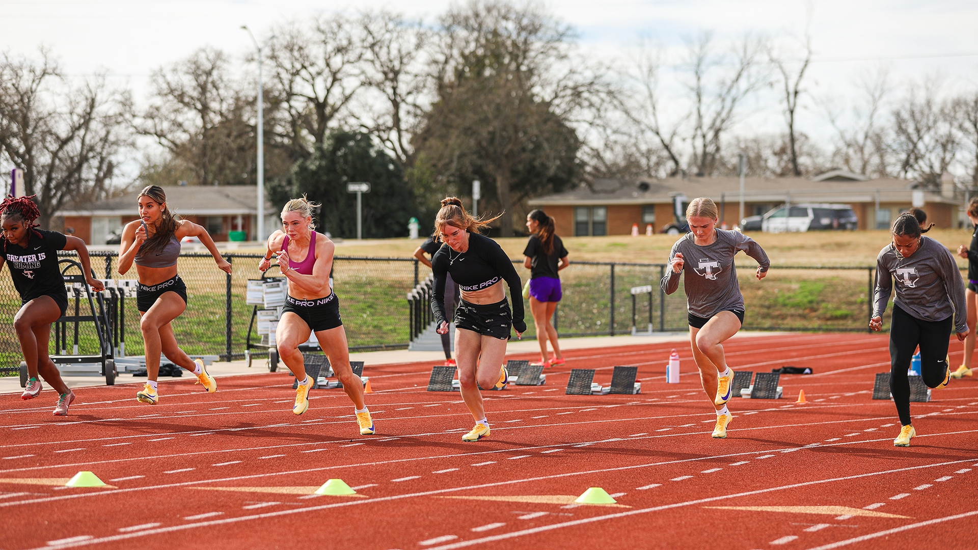 Tarleton State Sprinters taking out of the blocks at practice
