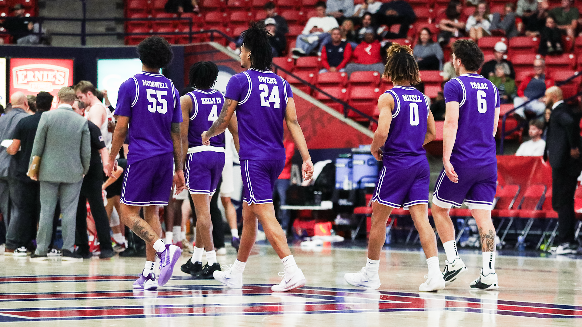 Tarleton State Men's basketball walking onto the floor after a timeout