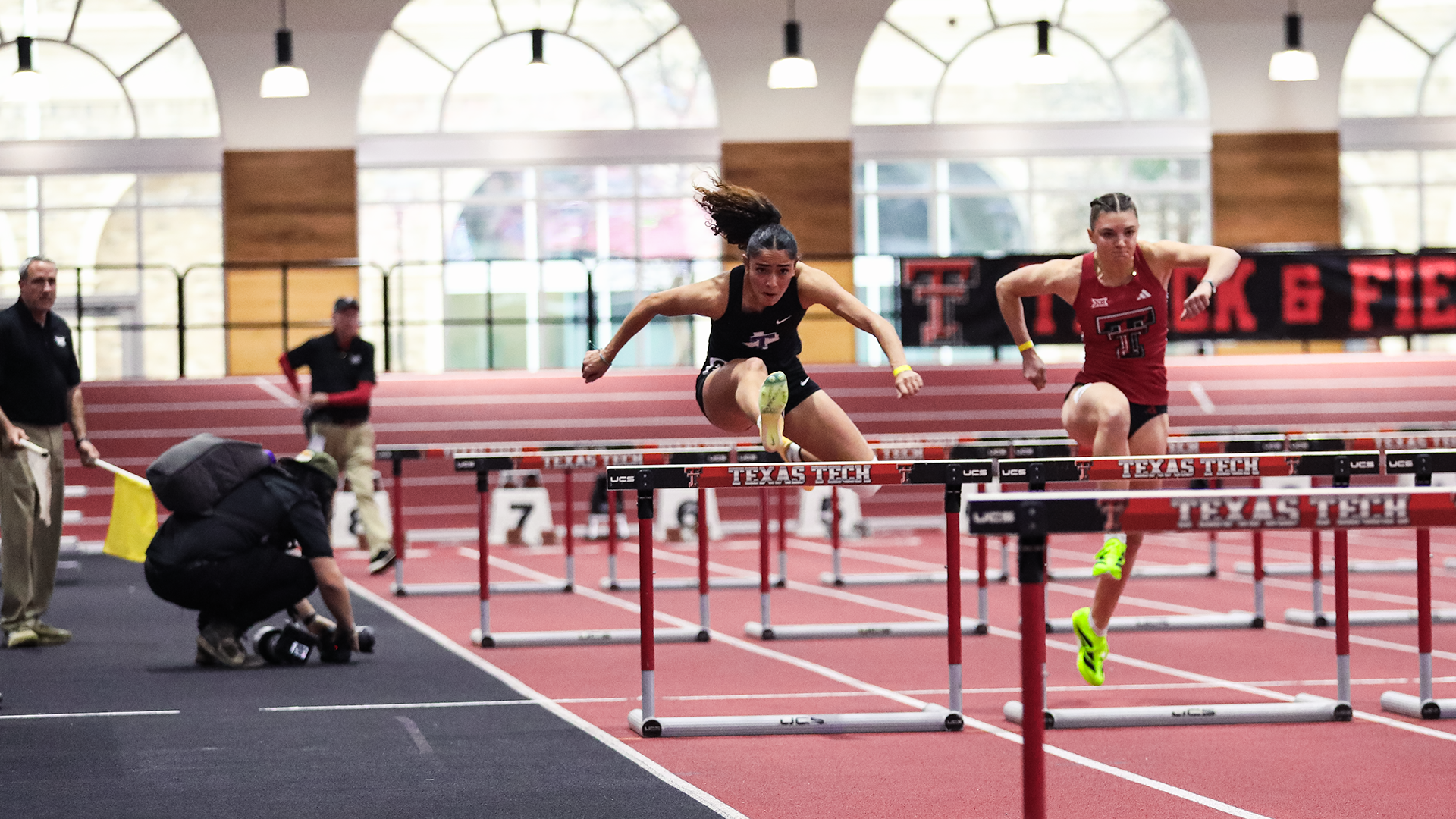 Malak Rashwan going over a hurdle at the Texas Tech meet