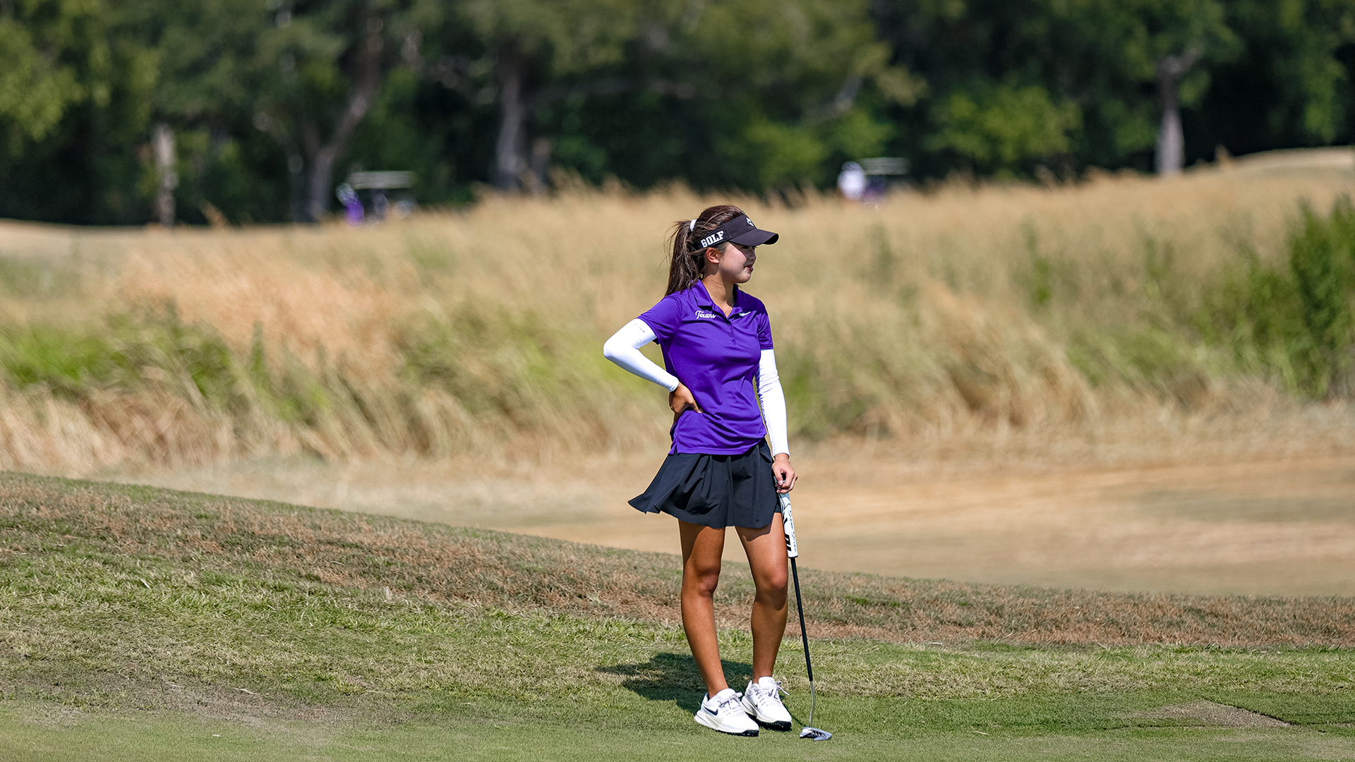 Gina Chen smiling on the course