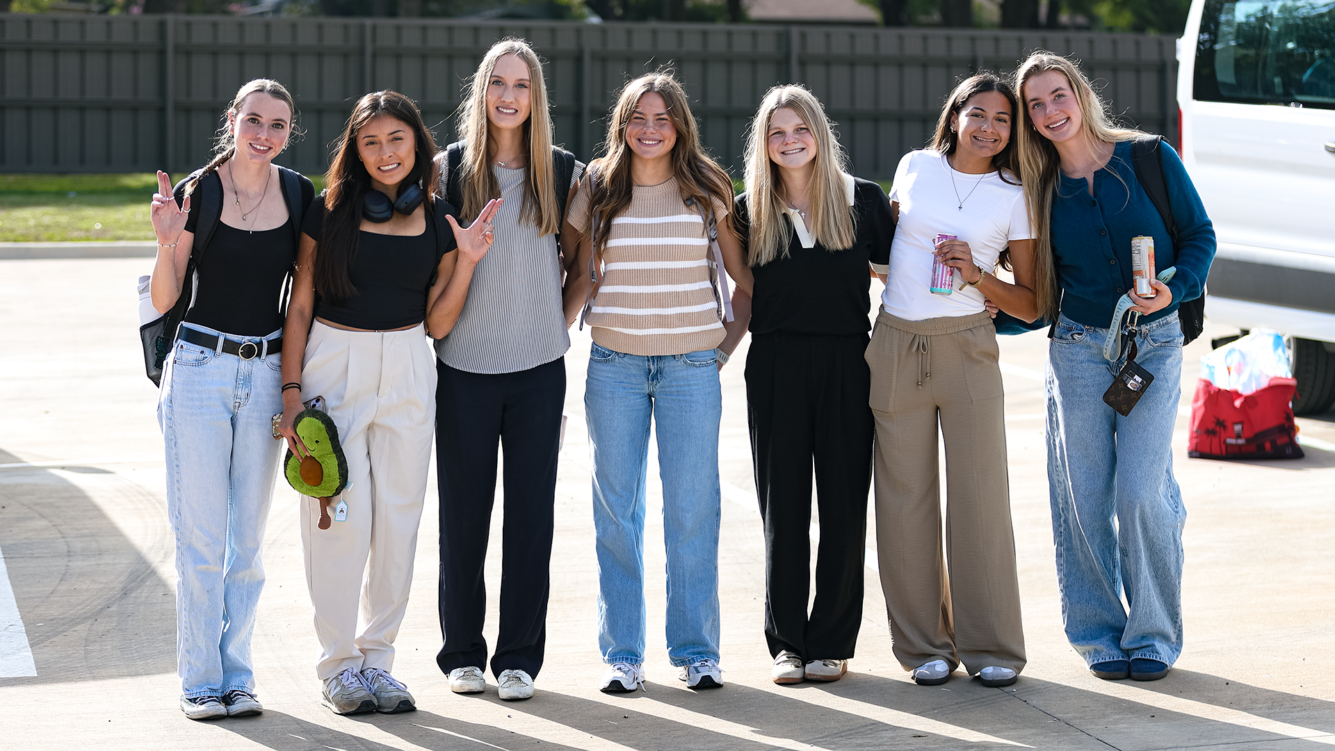 Women's Cross Country Team photo before loading the bus to head to Kentucky (Photo used Oct. 29)