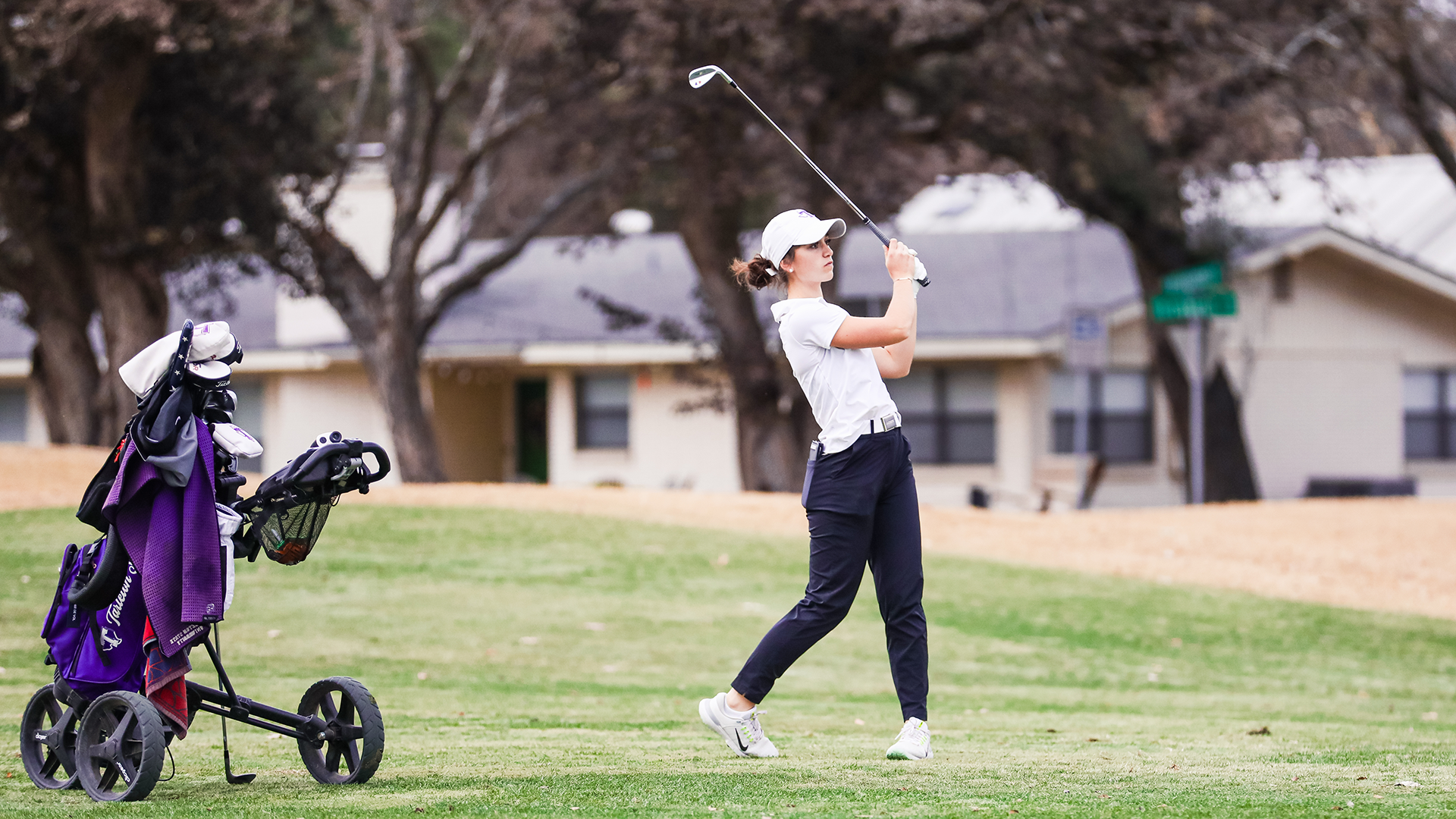 Lou Deltombe club raised after hitting from fairway