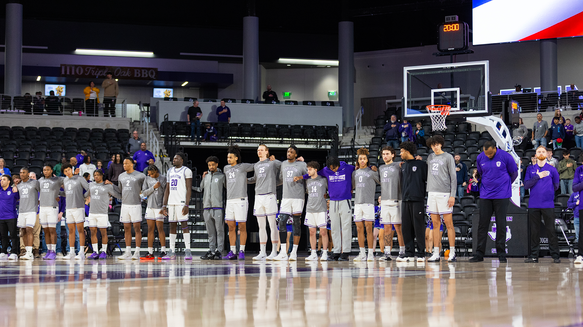 Tarleton State Men's Basketball standing for national anthem