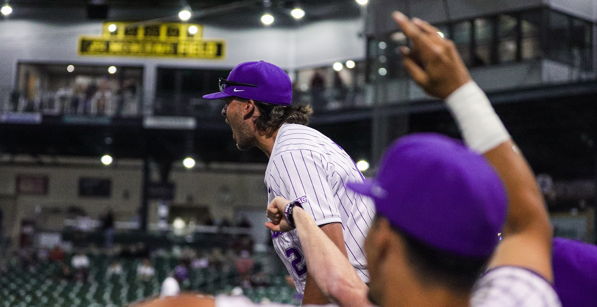 Texans celebrate after big play on March 22, 2026 as they face Stephen F. Austin.