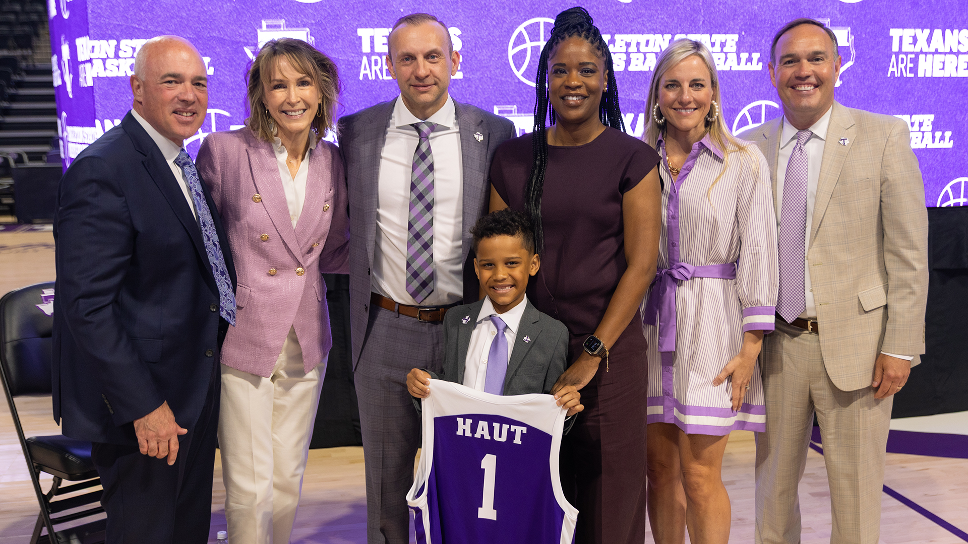 Head coach Eric Haut press conference jersey photo