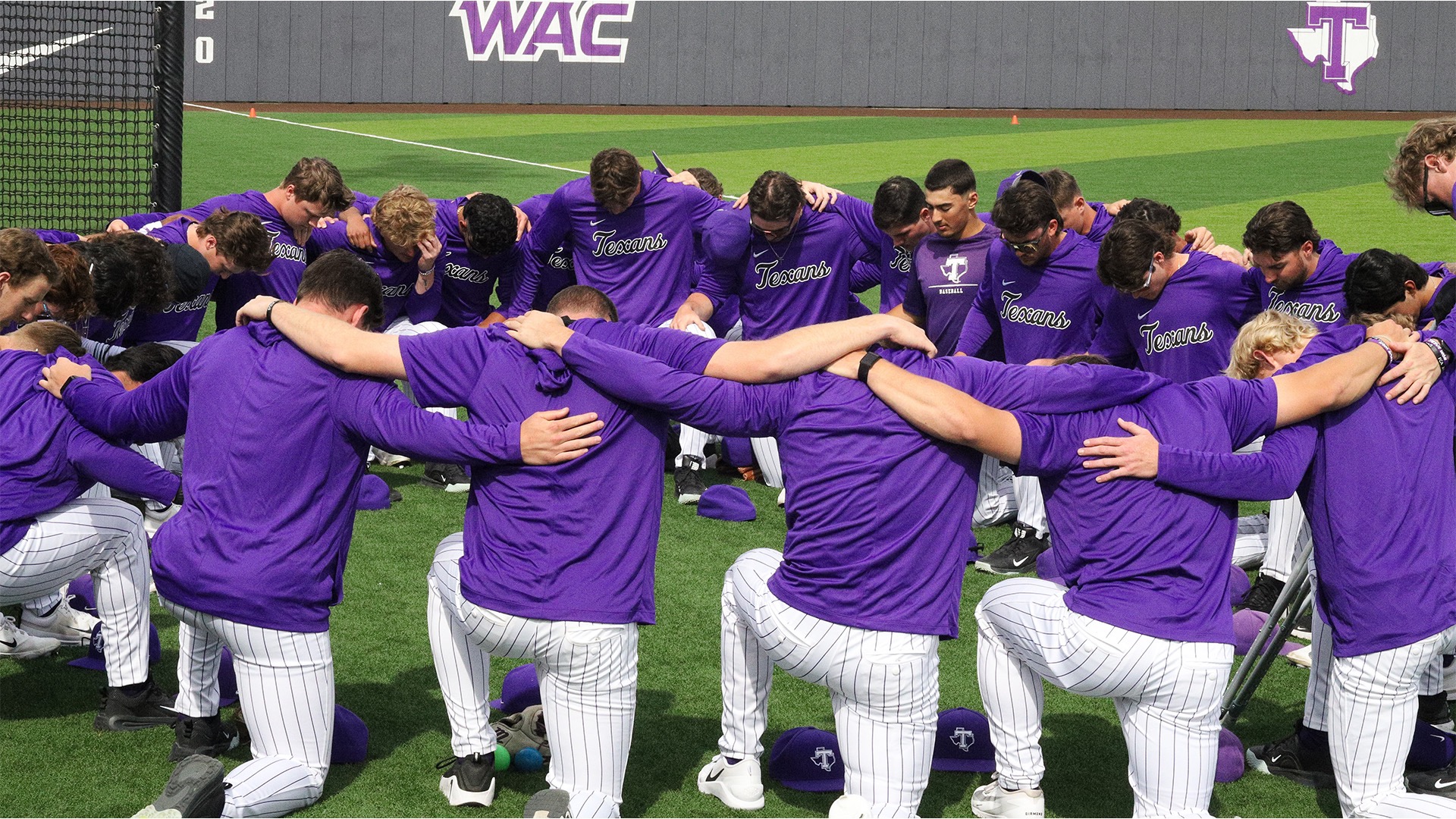Texans gather for a pregame prayer before game against Lamar on March 24, 2026 in Beaumont, Tx. 