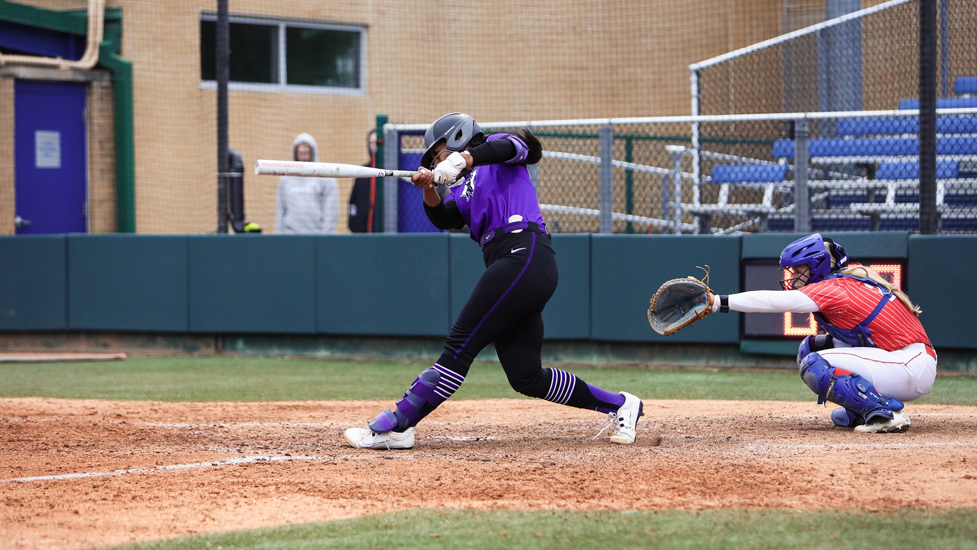 Izzy Bojkovic hitting a homer against UTA in conference opener.