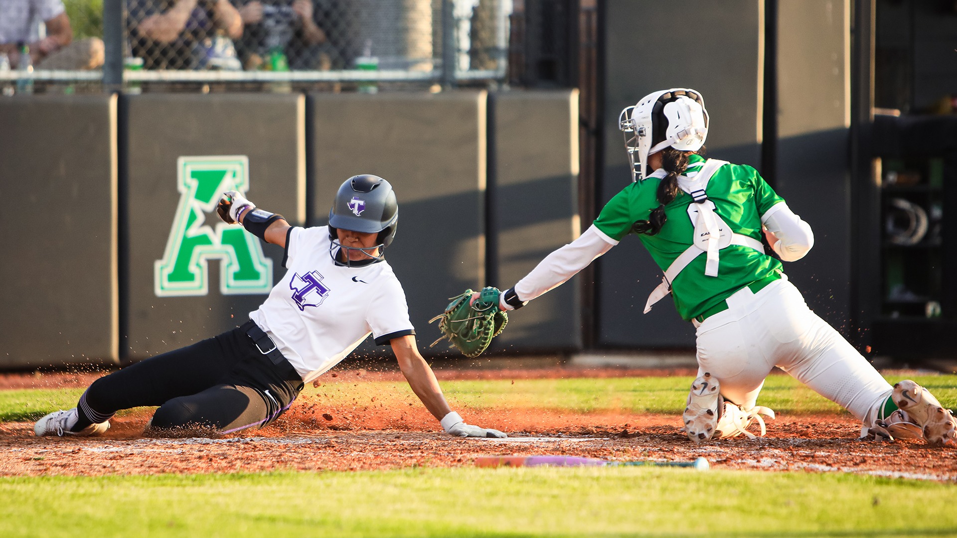 Mariah Debose sliding to score a run at North Texas.