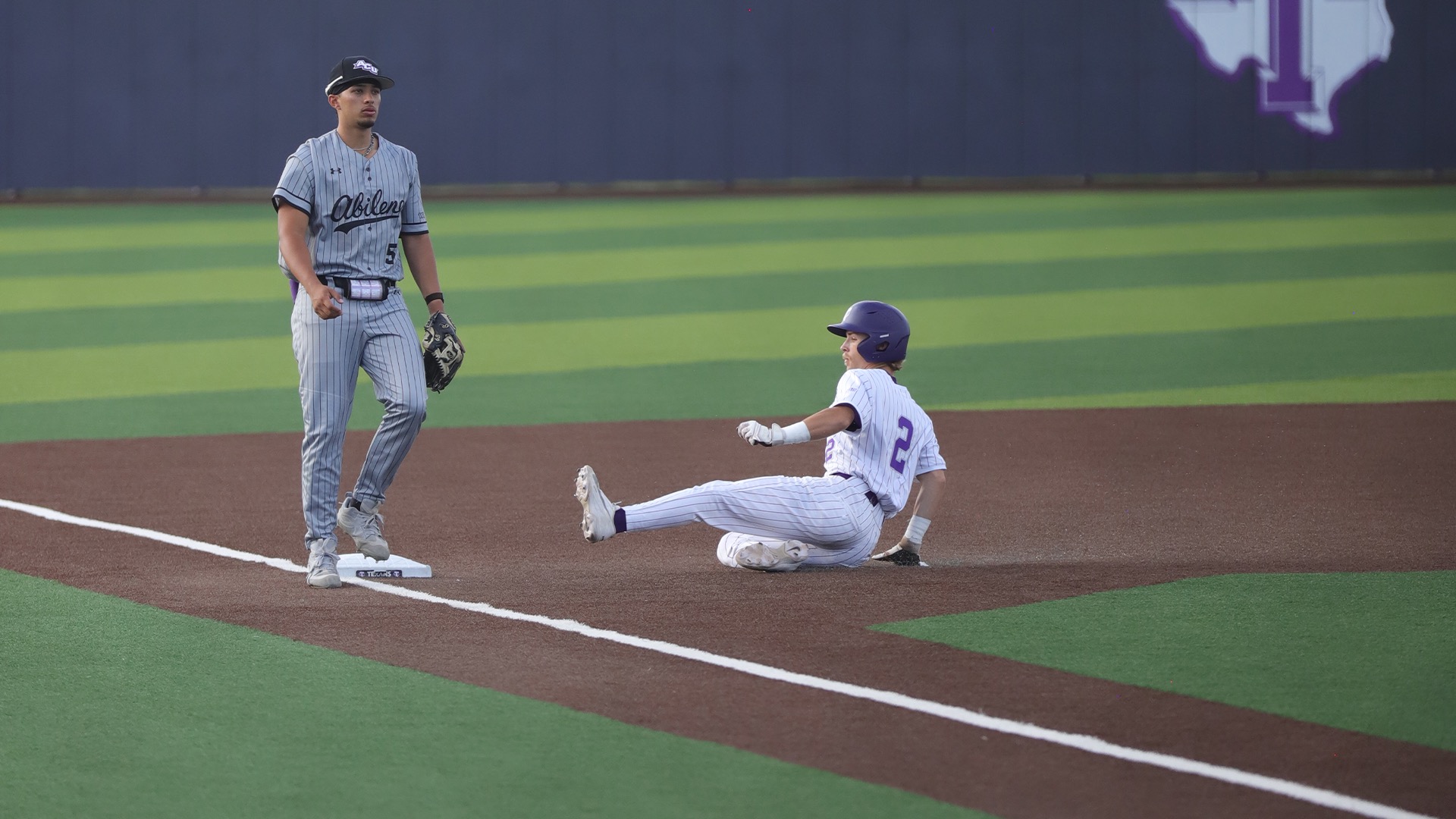 Ike Shirey steals third base as the Texas work towards tying a single-game record against ACU on Thursday. 