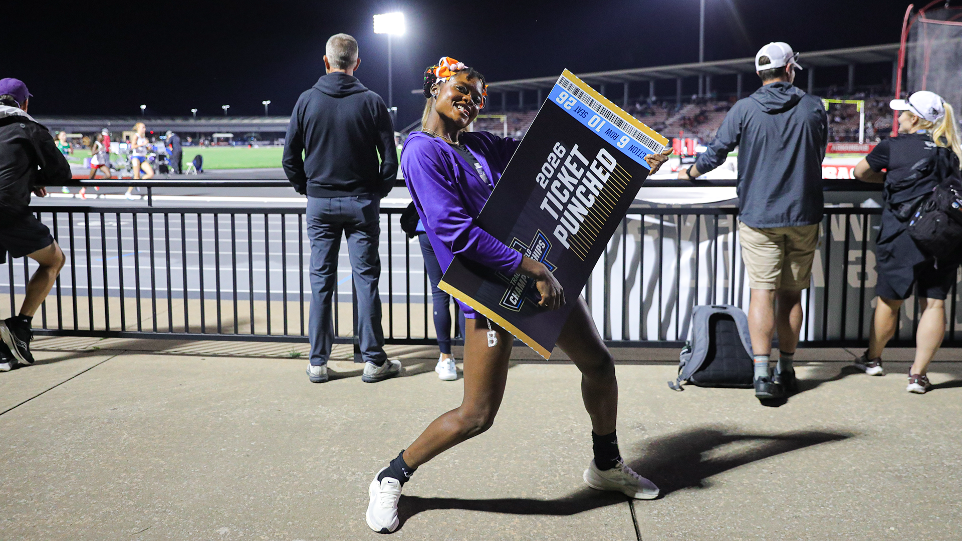 Prestina Ochonogor posing, celebrating with 2026 Ticket Punched sign.