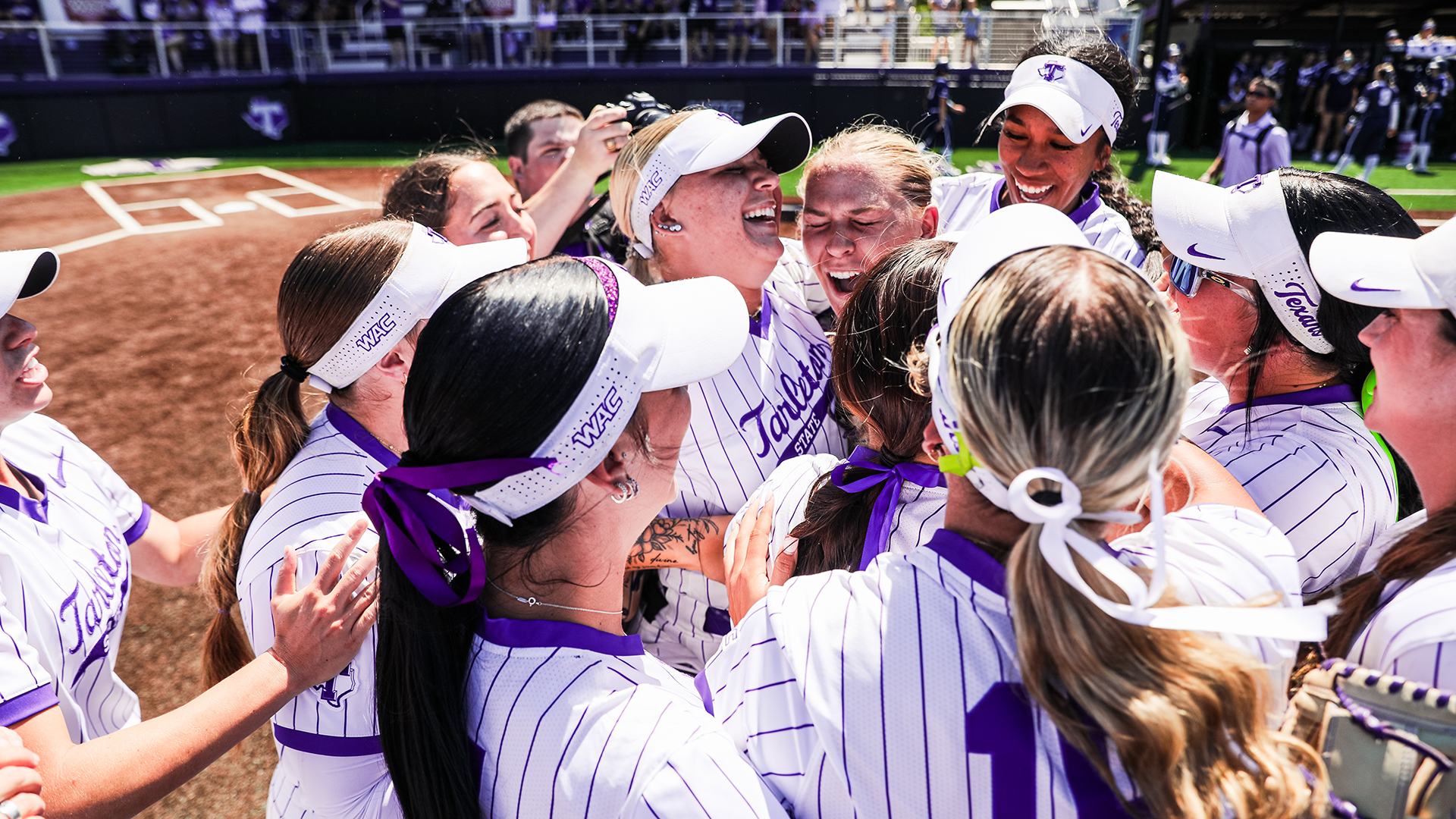 Shelby Schultz and teammates cheering after game 1 victory
