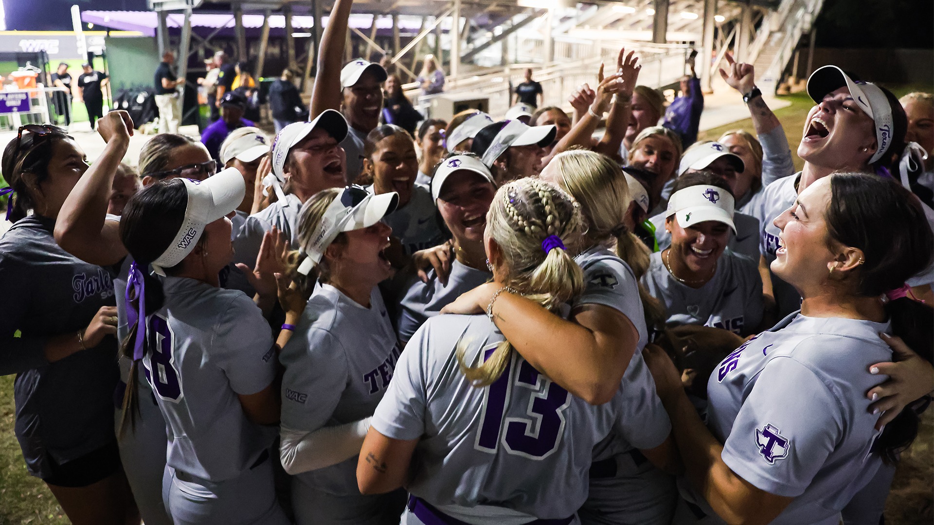 Texan Softball celebrating after WAC semifinal win