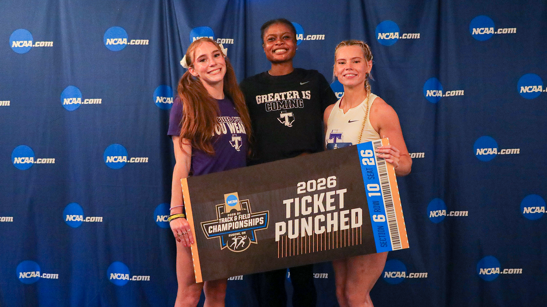 Victoria Cameron, Lauren Roy and Prestina Ochonogor posing with the ticket punched sign 