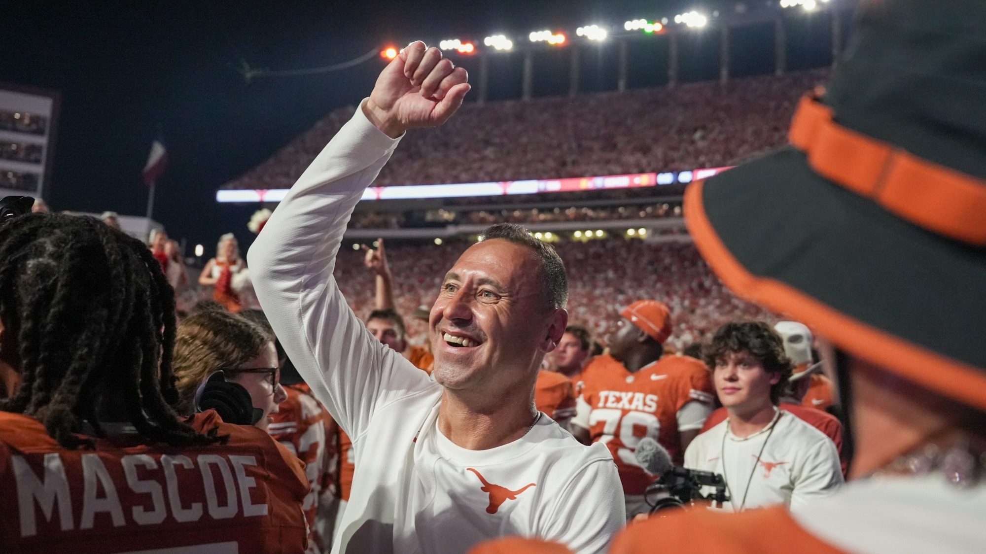 Texas head coach Steve Sarkisian celebrating after the Longhorns' 24-23 comeback against Ohio State