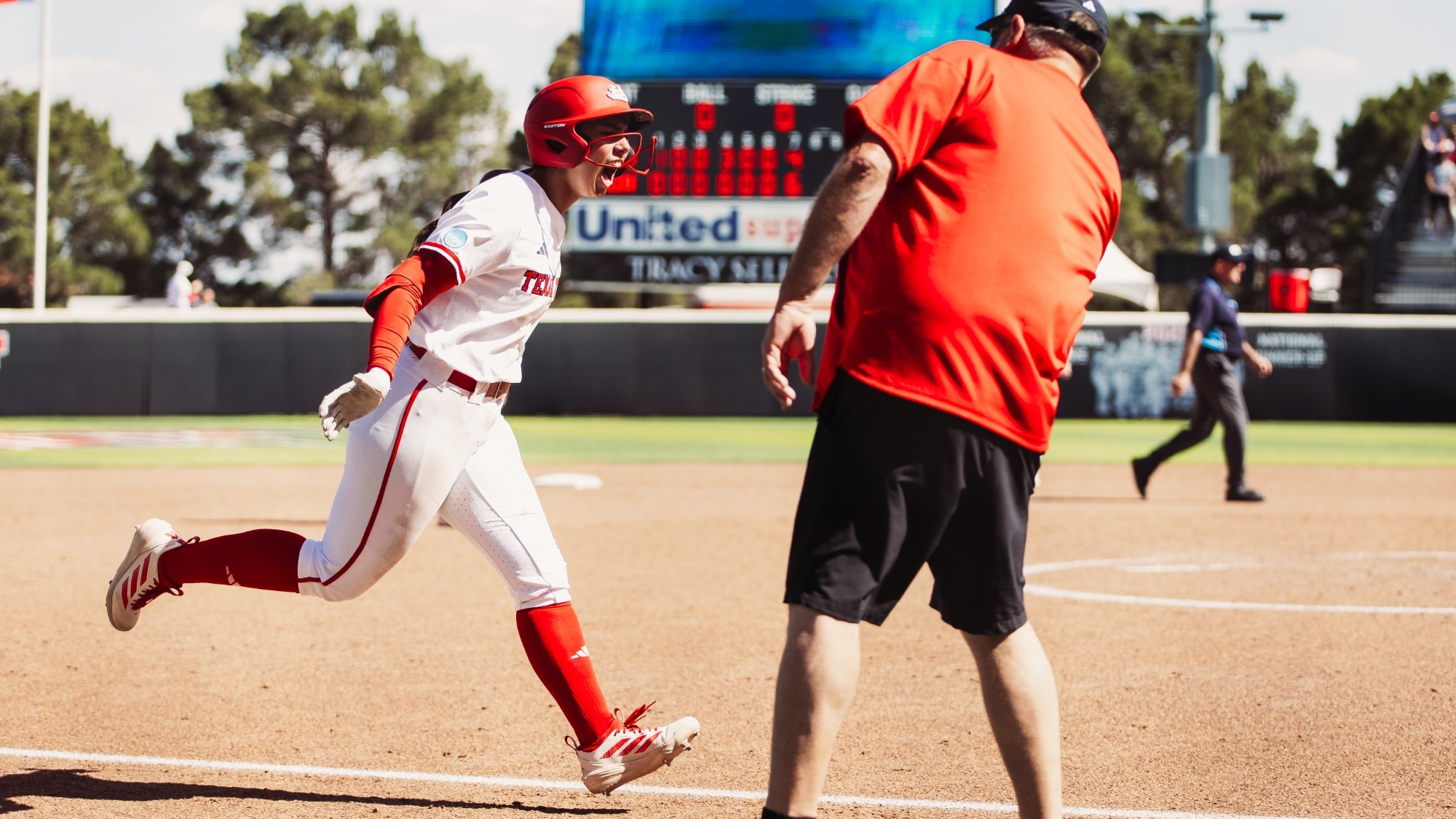 Texas Tech celebrates Lauren Allred's seventh-inning grand slam against Ole Miss