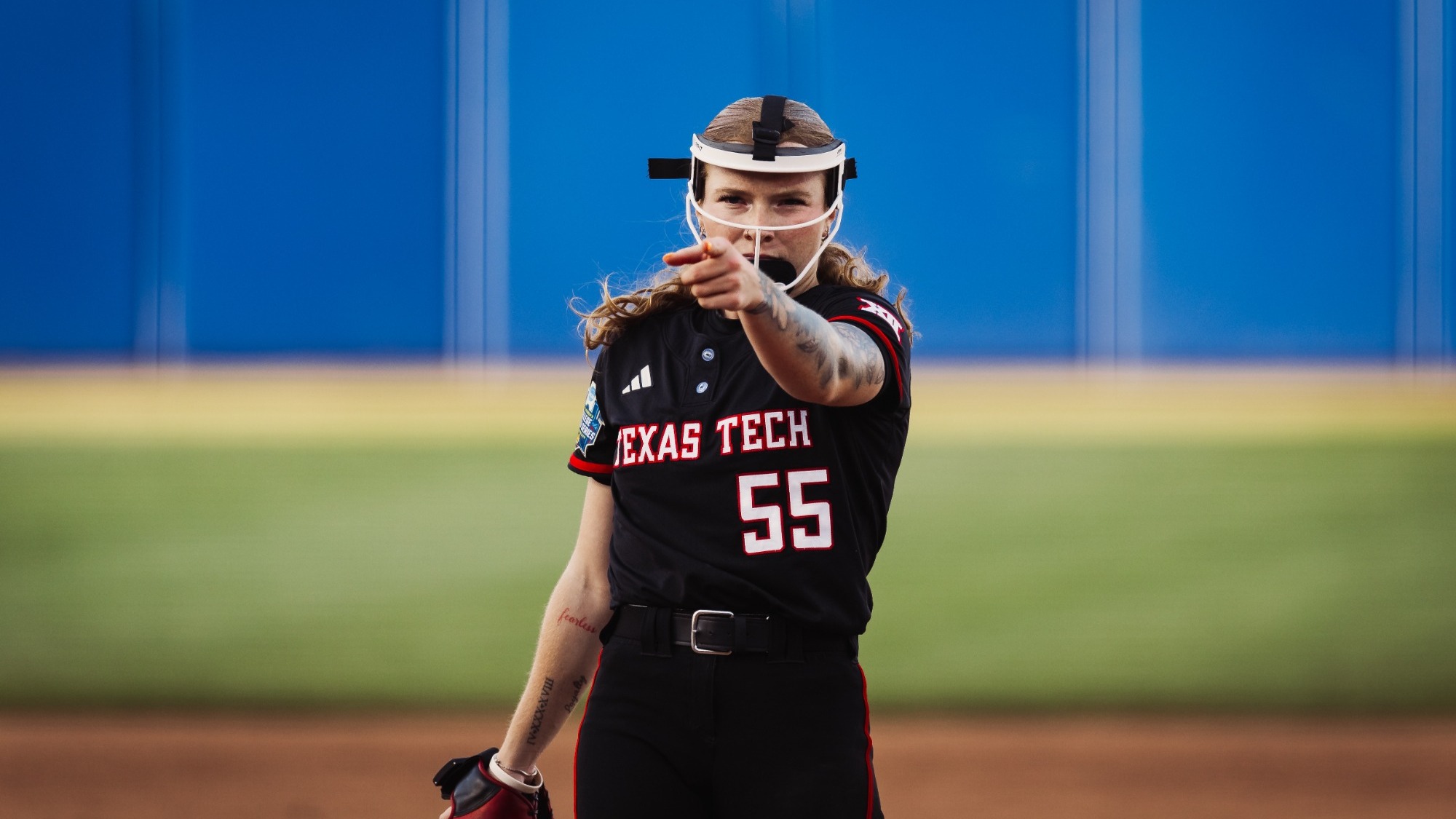 Texas Tech's Kaitlyn Terry celebrates a strikeout during the Red Raiders' WCWS run