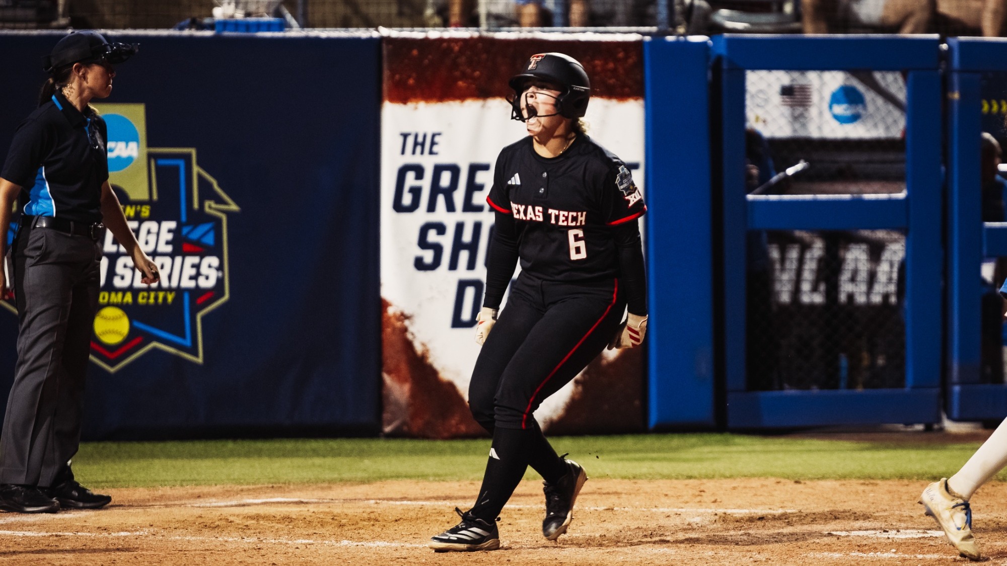 Texas Tech celebrates Taylor Pannell scoring a run during the Red Raiders' nine-inning elimination win over UCLA