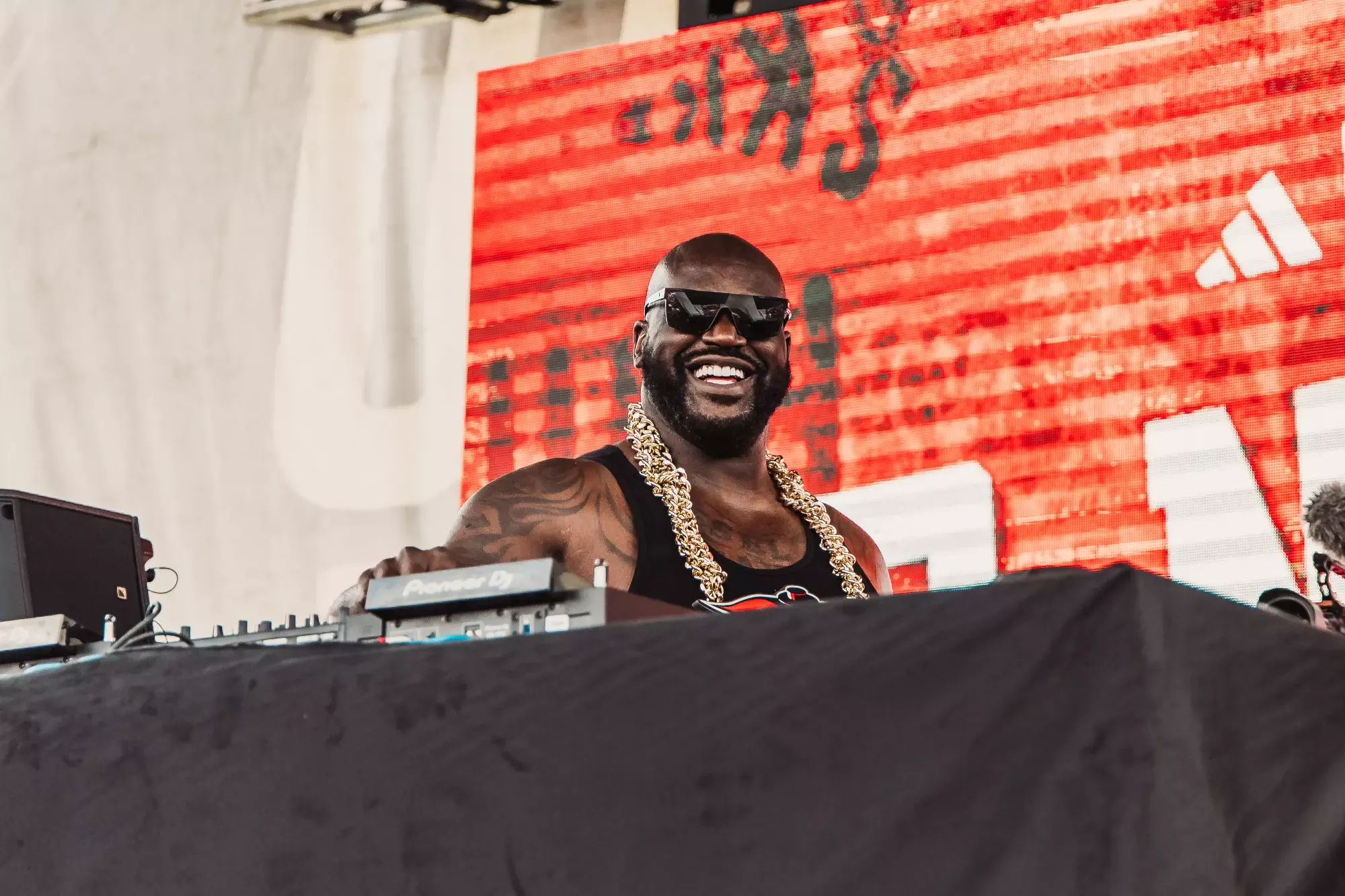 DJ Diesel performs for fans during Raider Alley.