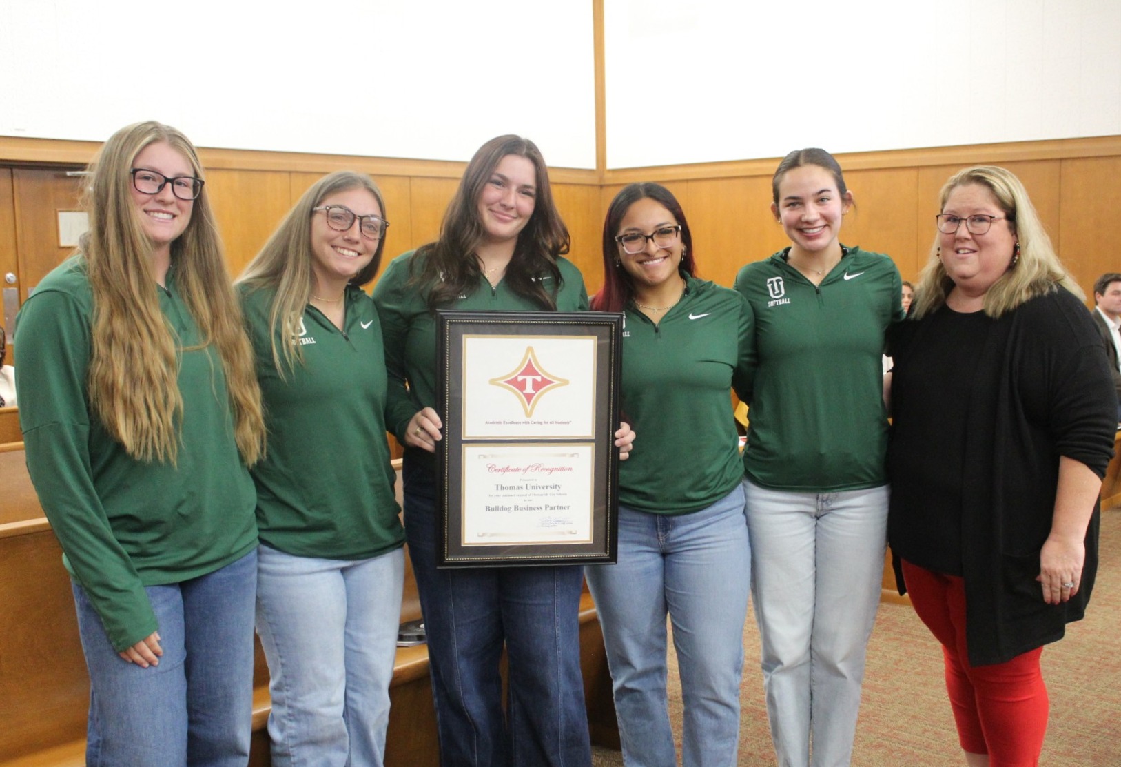 TU Softball: Scott Elementary School Principal Carie Young stands with the Bulldog Business Partner of the Month TU Softball . (Jill Holloway/The Thomasville Times-Enterprise)
