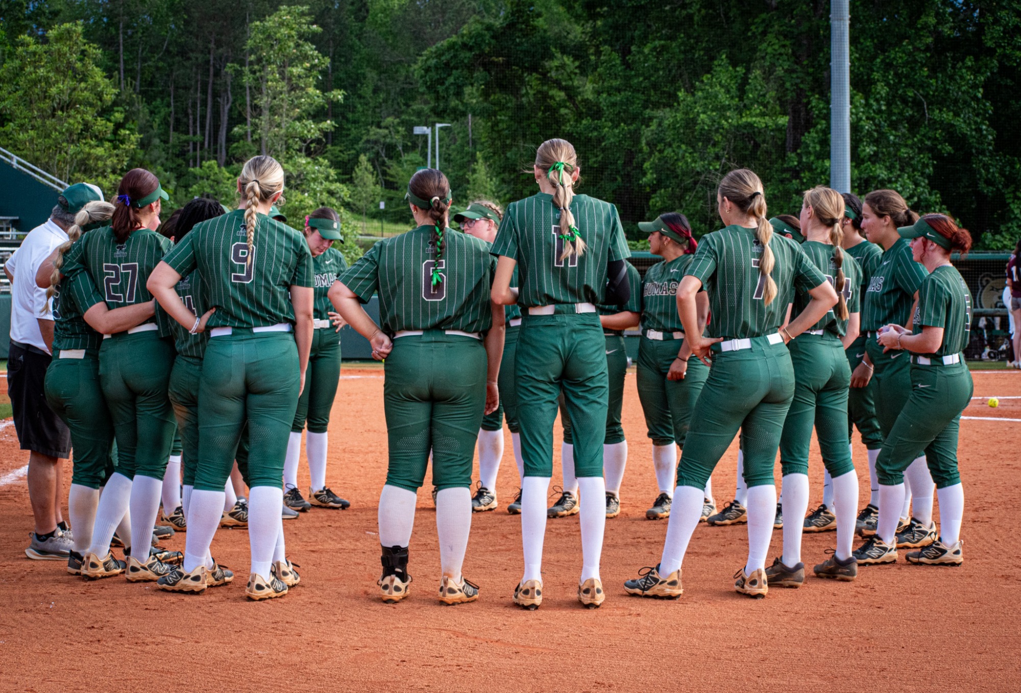 Team huddle following Evangel loss