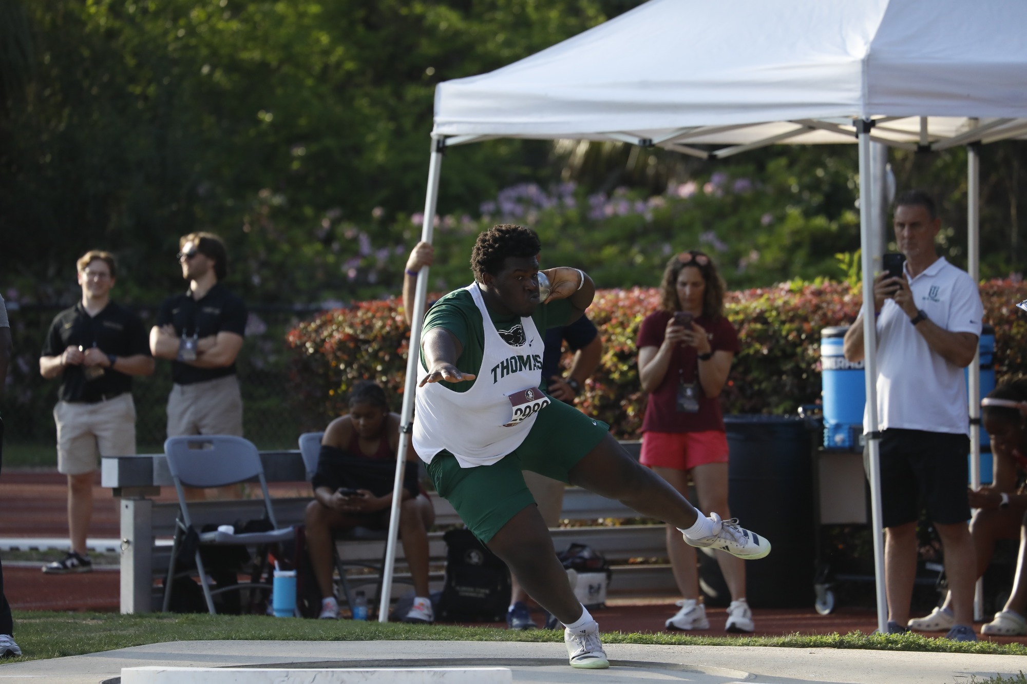 Jadon Parker throws shot put