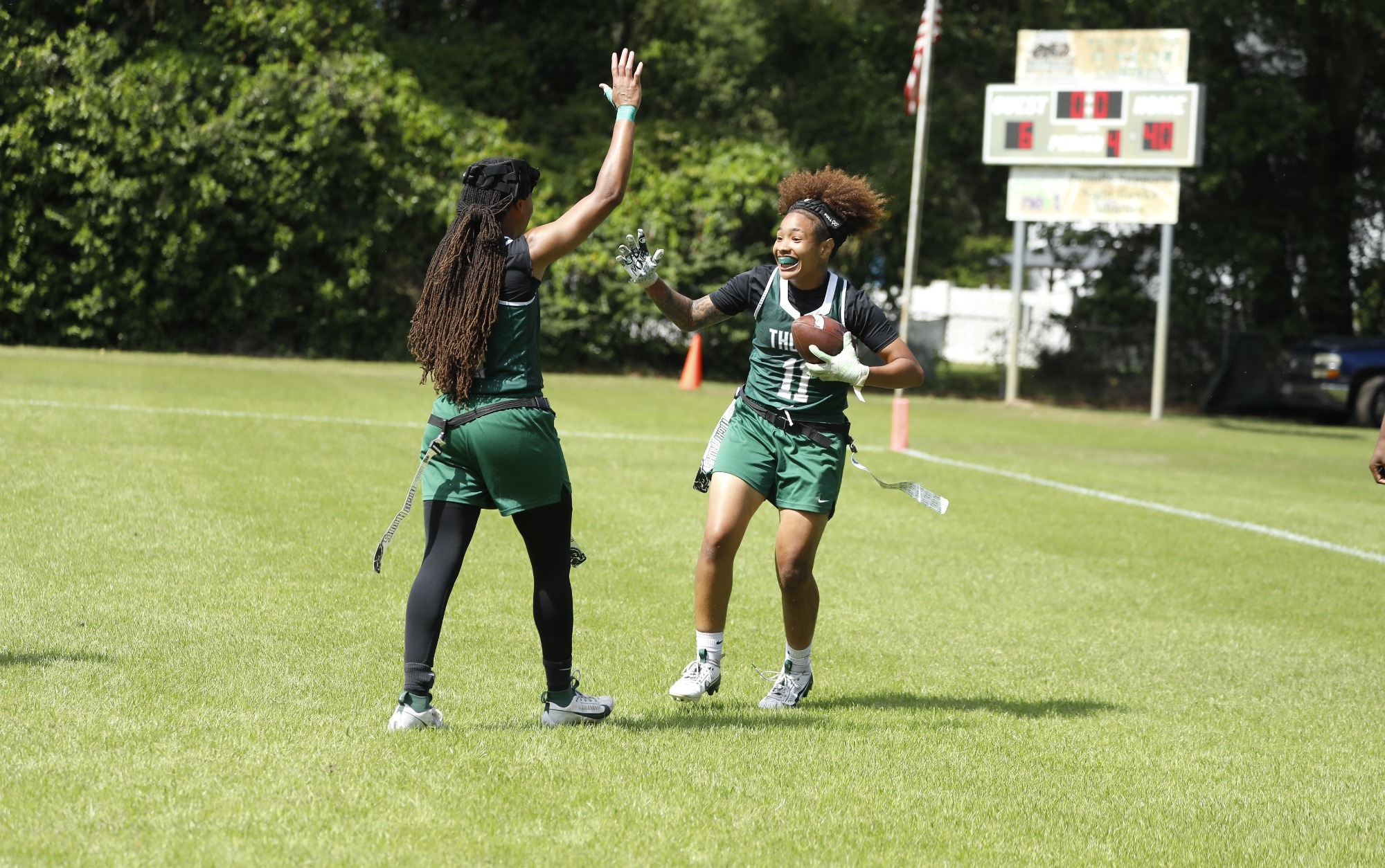Azariah Greer and Destiny Lockett celebrate a touchdown