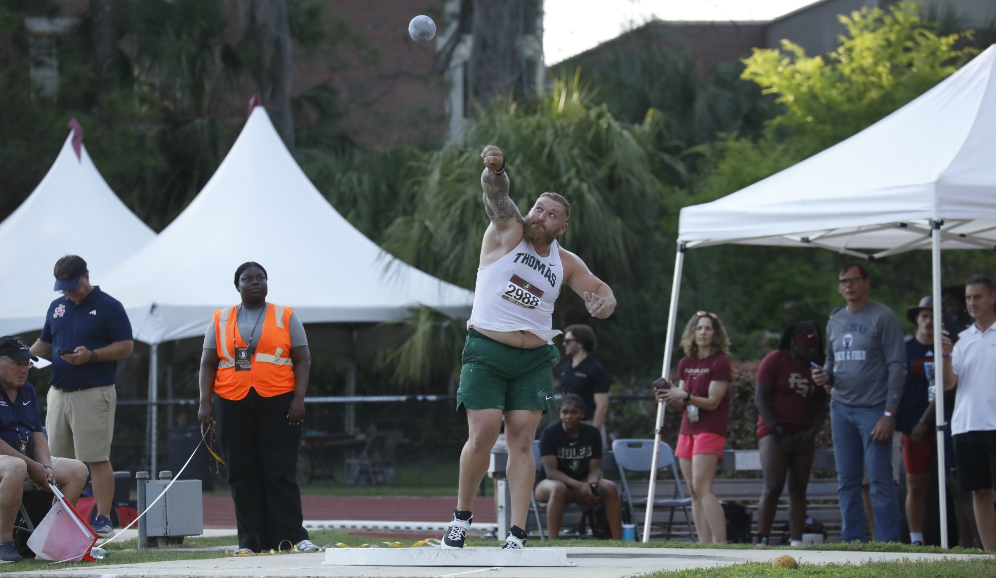 Connor Munn throws shot put